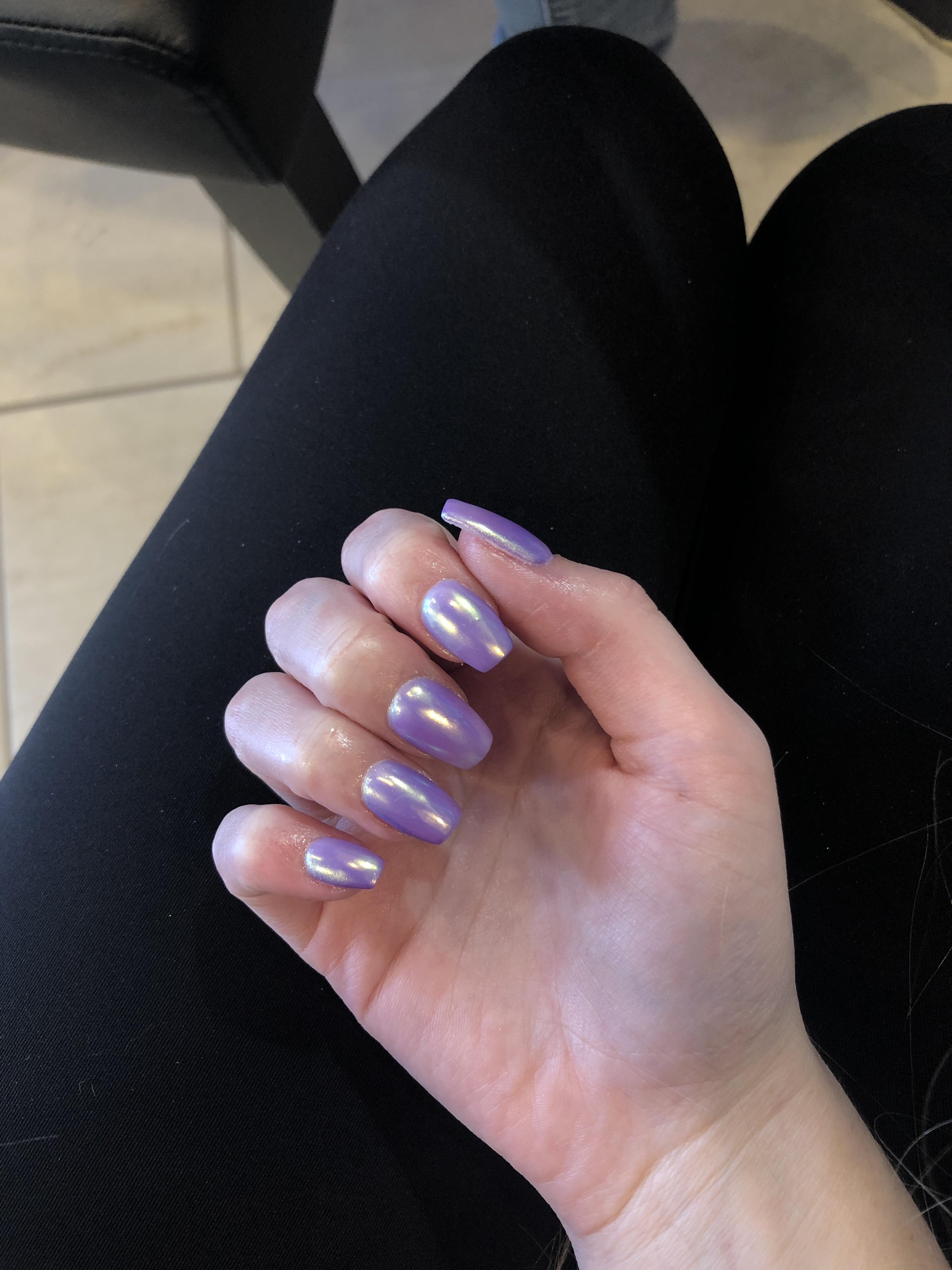 I have dip powder nails with a gel top coat from a holo powder. They’re