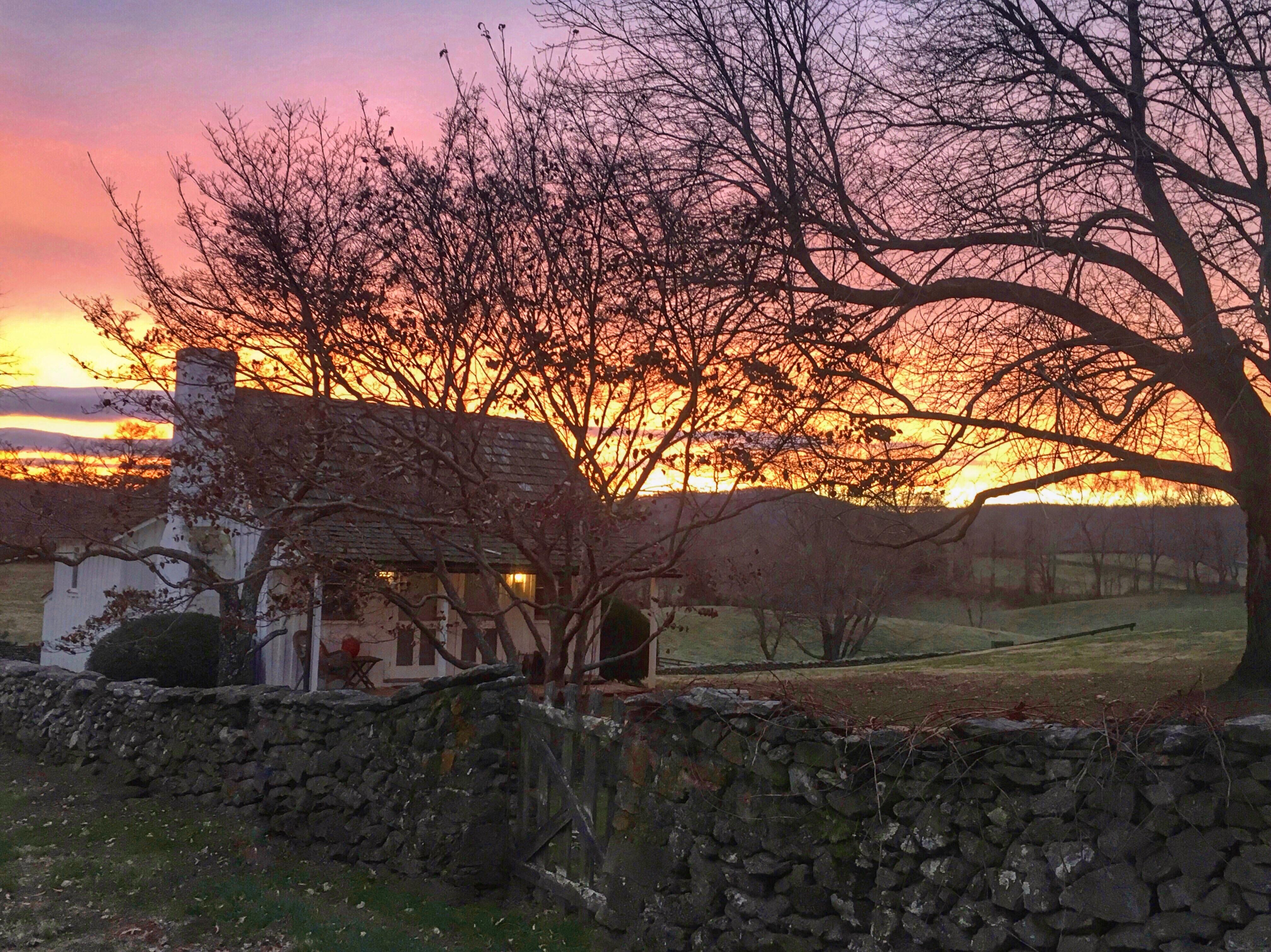 Sunrise this morning at my little farm cottage r/pics