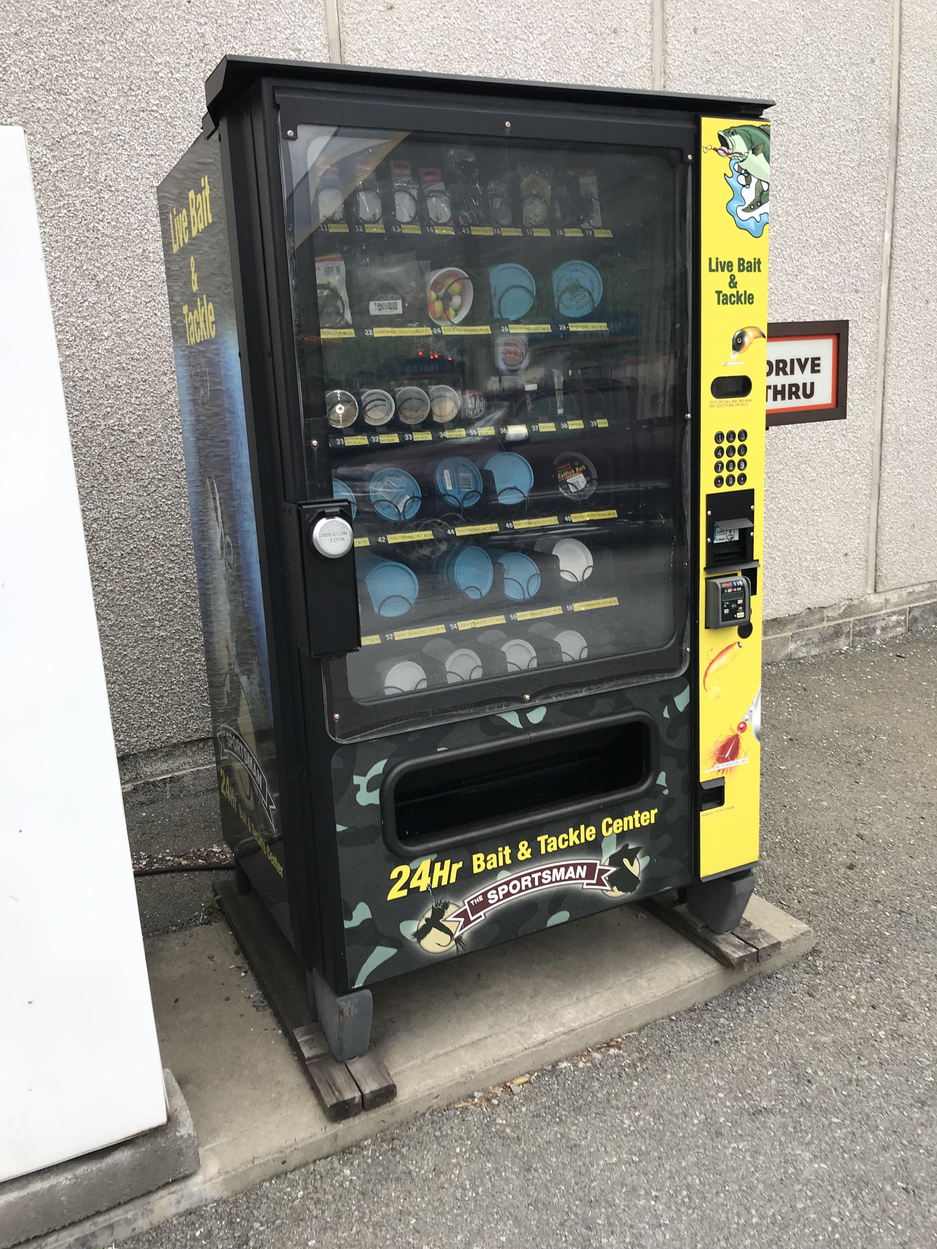 A fishing bait vending machine at a gas station. r/mildlyinteresting