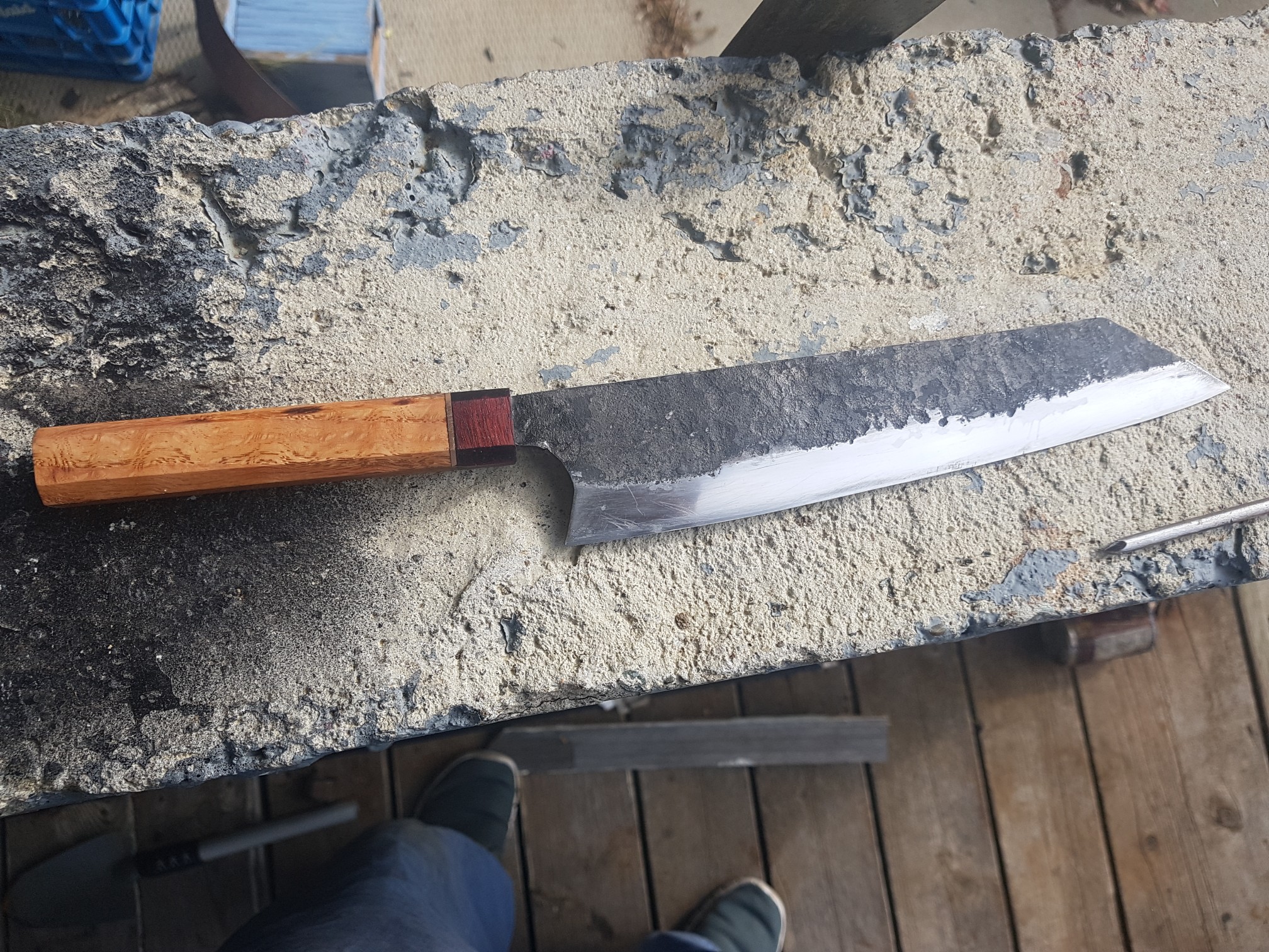 Look at this knife my best friend made! The handle is made of curled