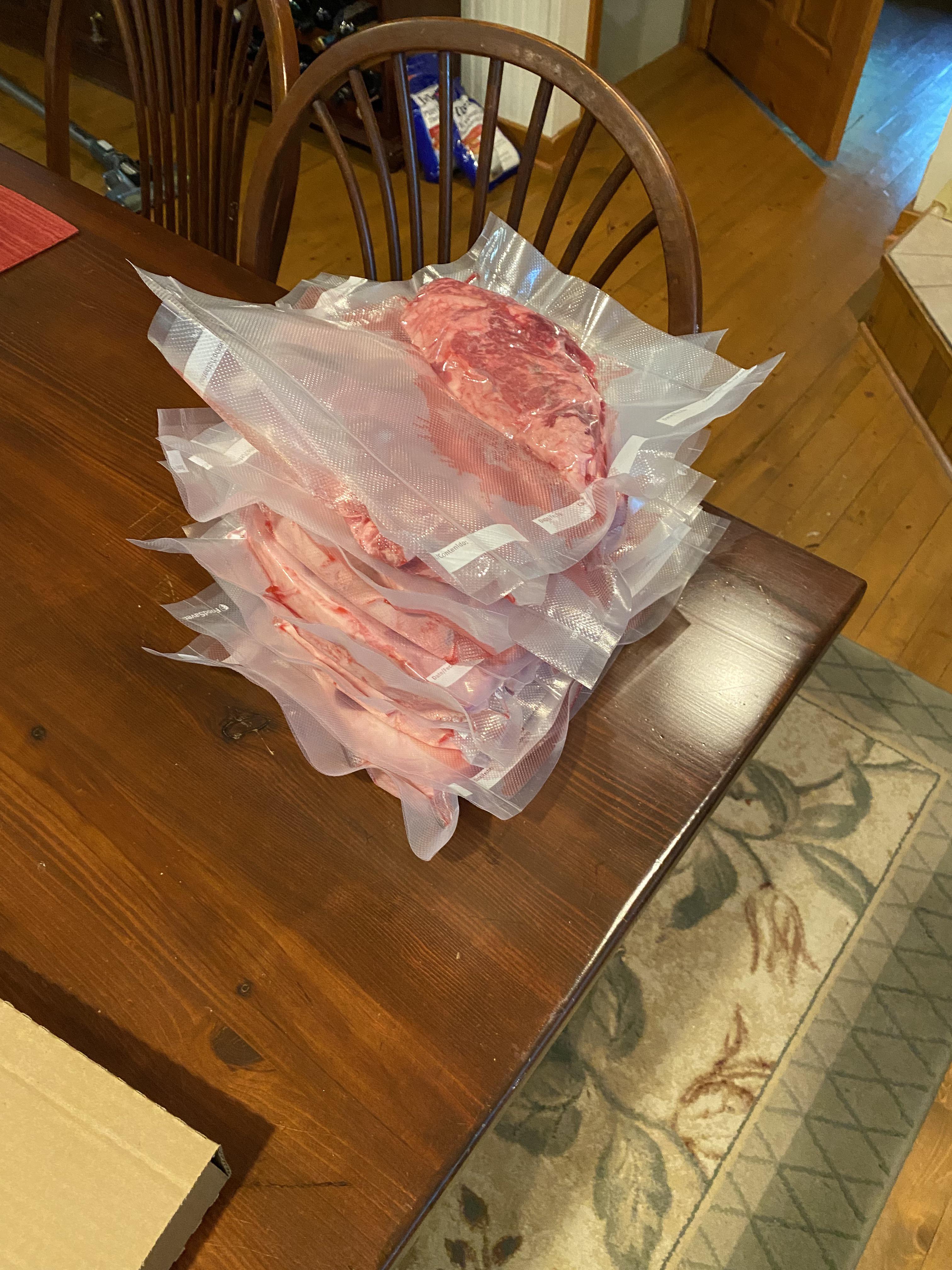 20 pounds of Costco rib roast cut into 11 steaks ready for the freezer