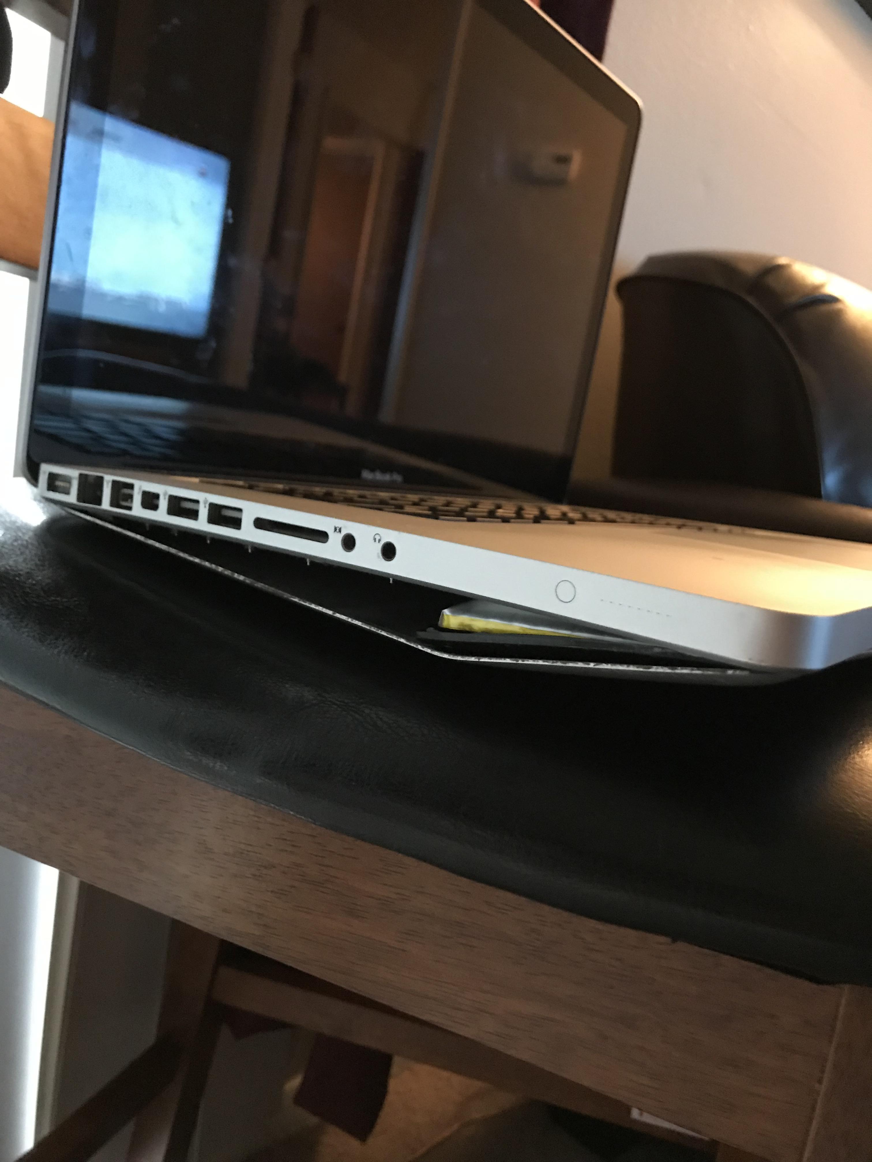 My laptop battery expanded to the point of blowing out the bottom of my