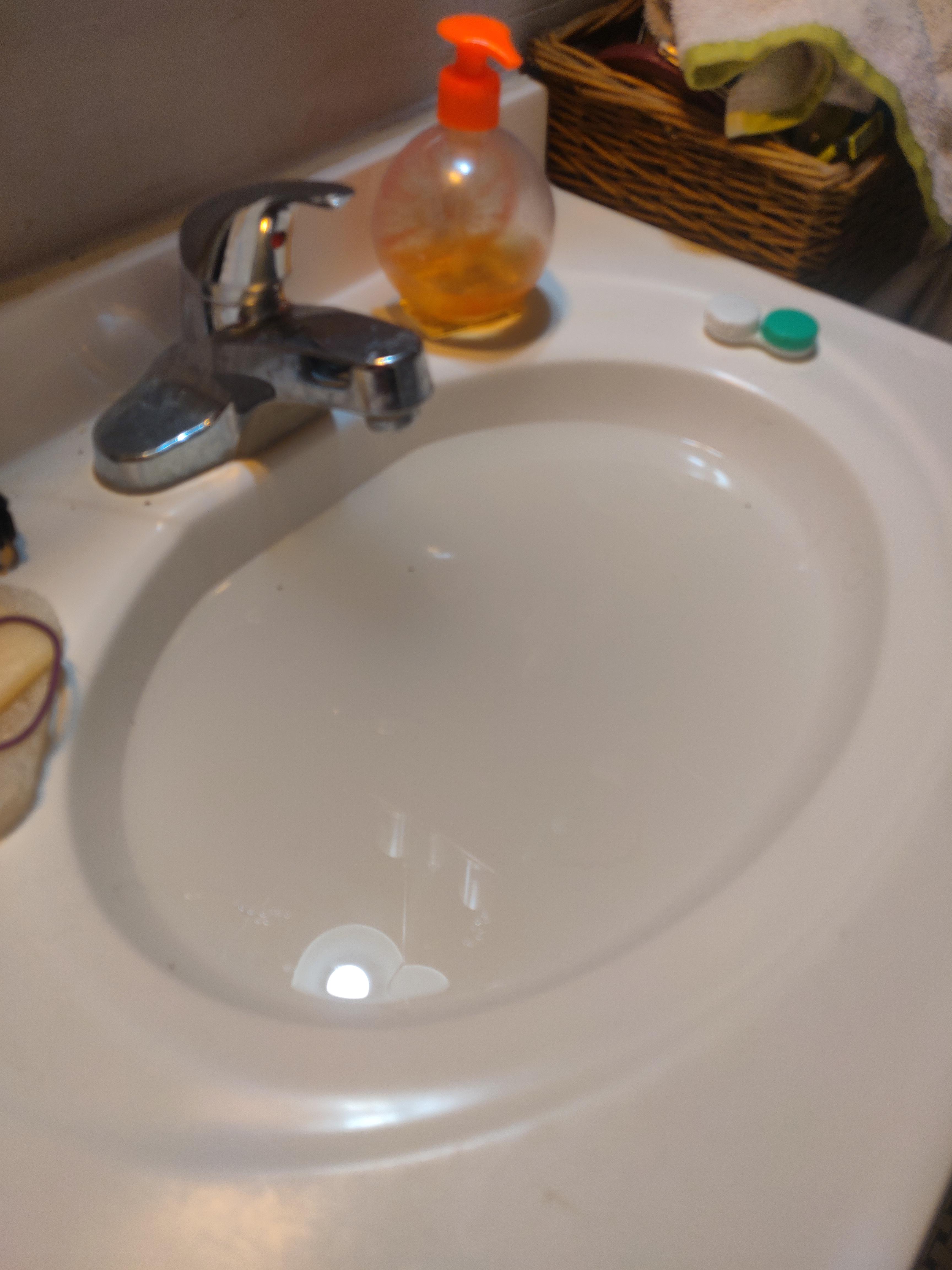 Mystery water in bathroom sink (info in comment) r/Plumbing