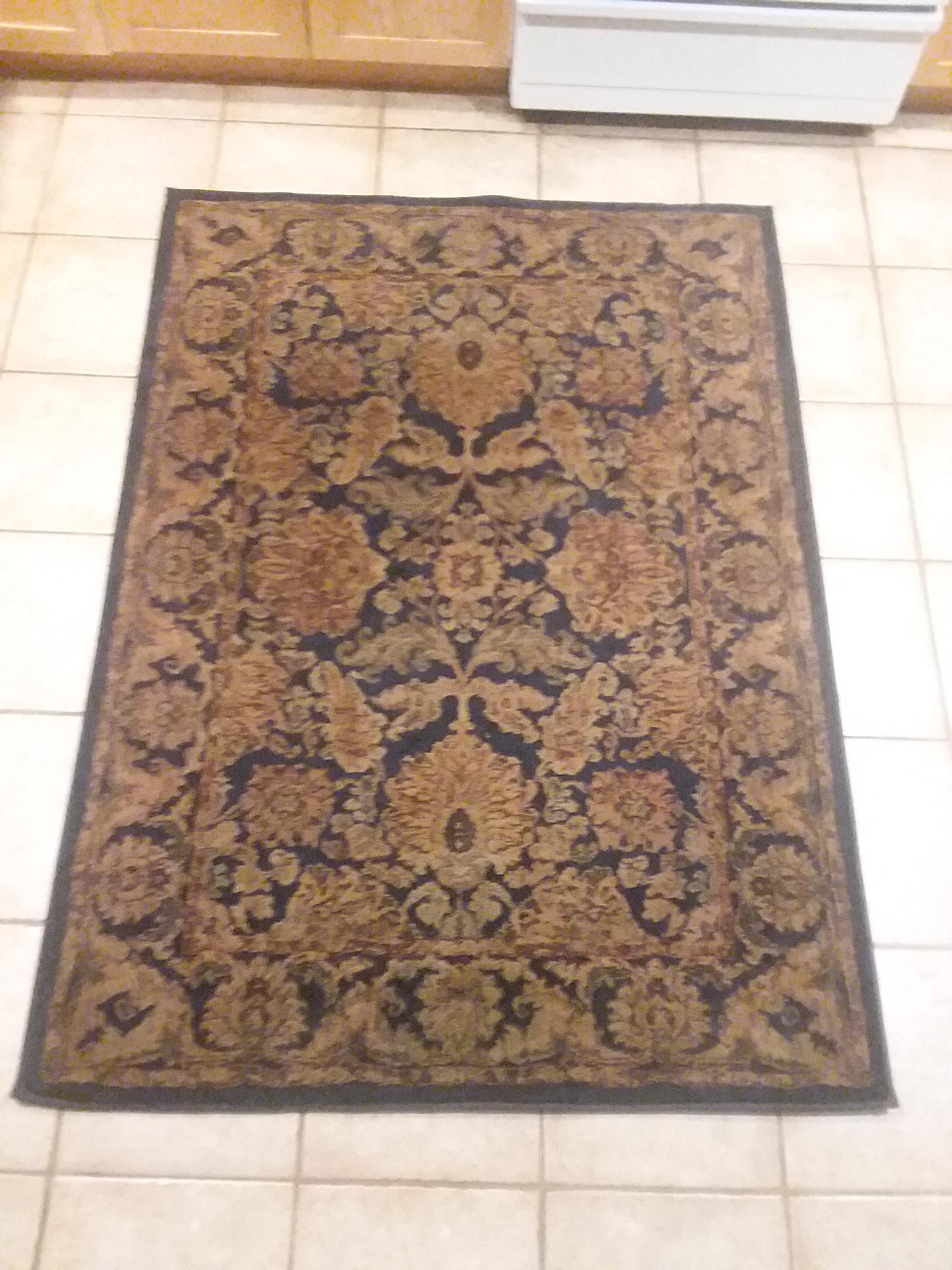 Found this really cool Persian Rug after some baking soda, vinegar