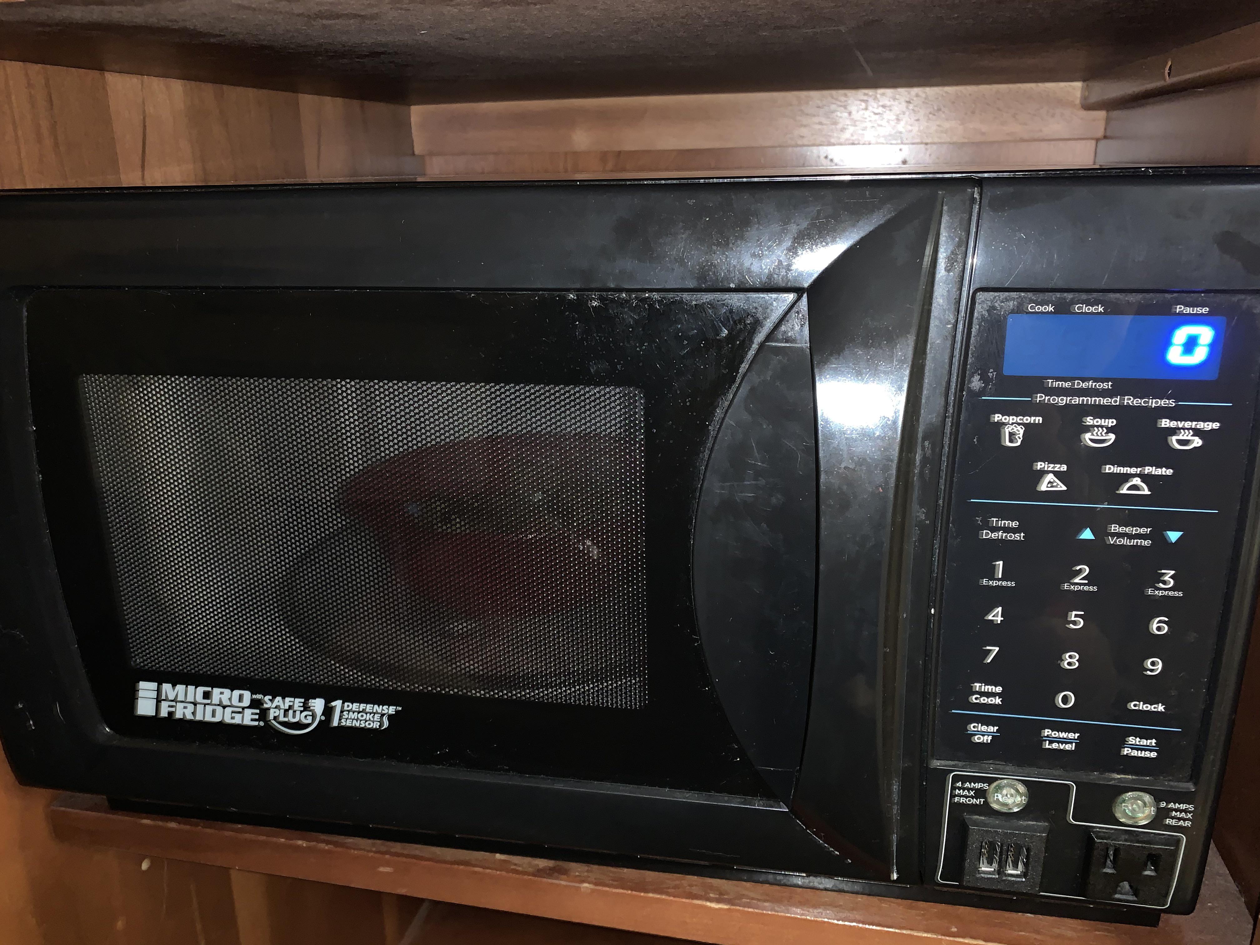 This microwave with USB ports, power outlet and adjustable beep volume