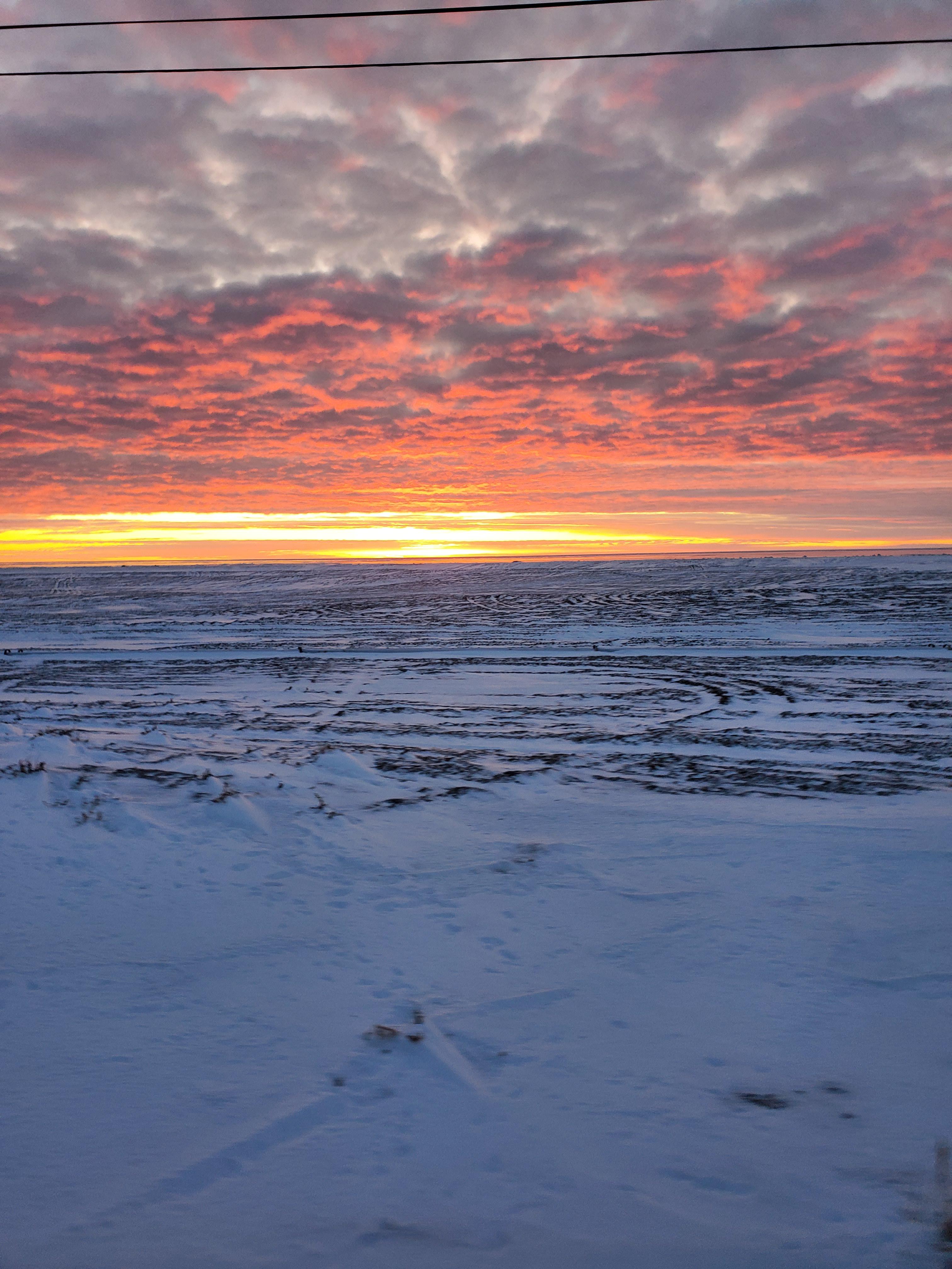 Pt. Hope Alaska where you get the su rise and sunset at the same time