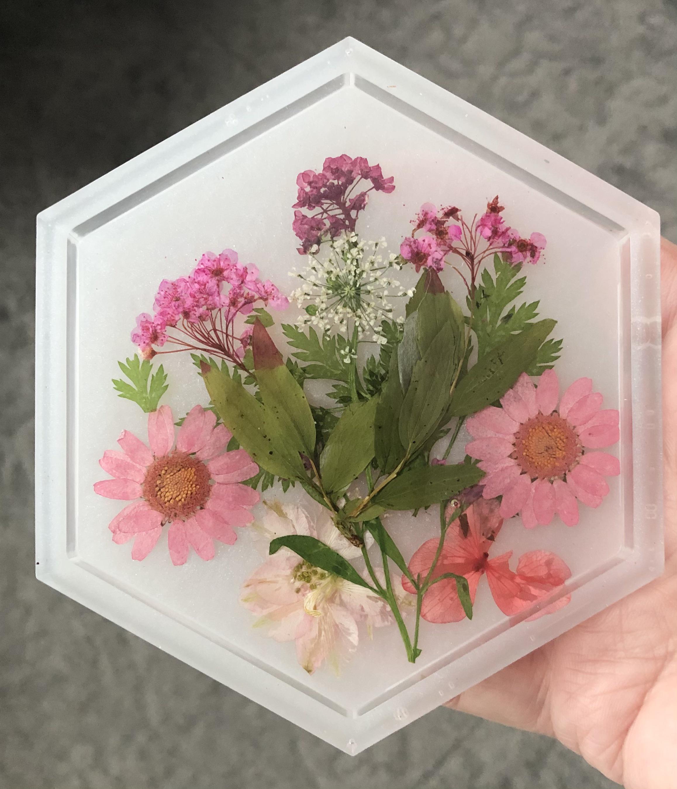 My first dried flowers casting. I ran out of opaque white pigment so it
