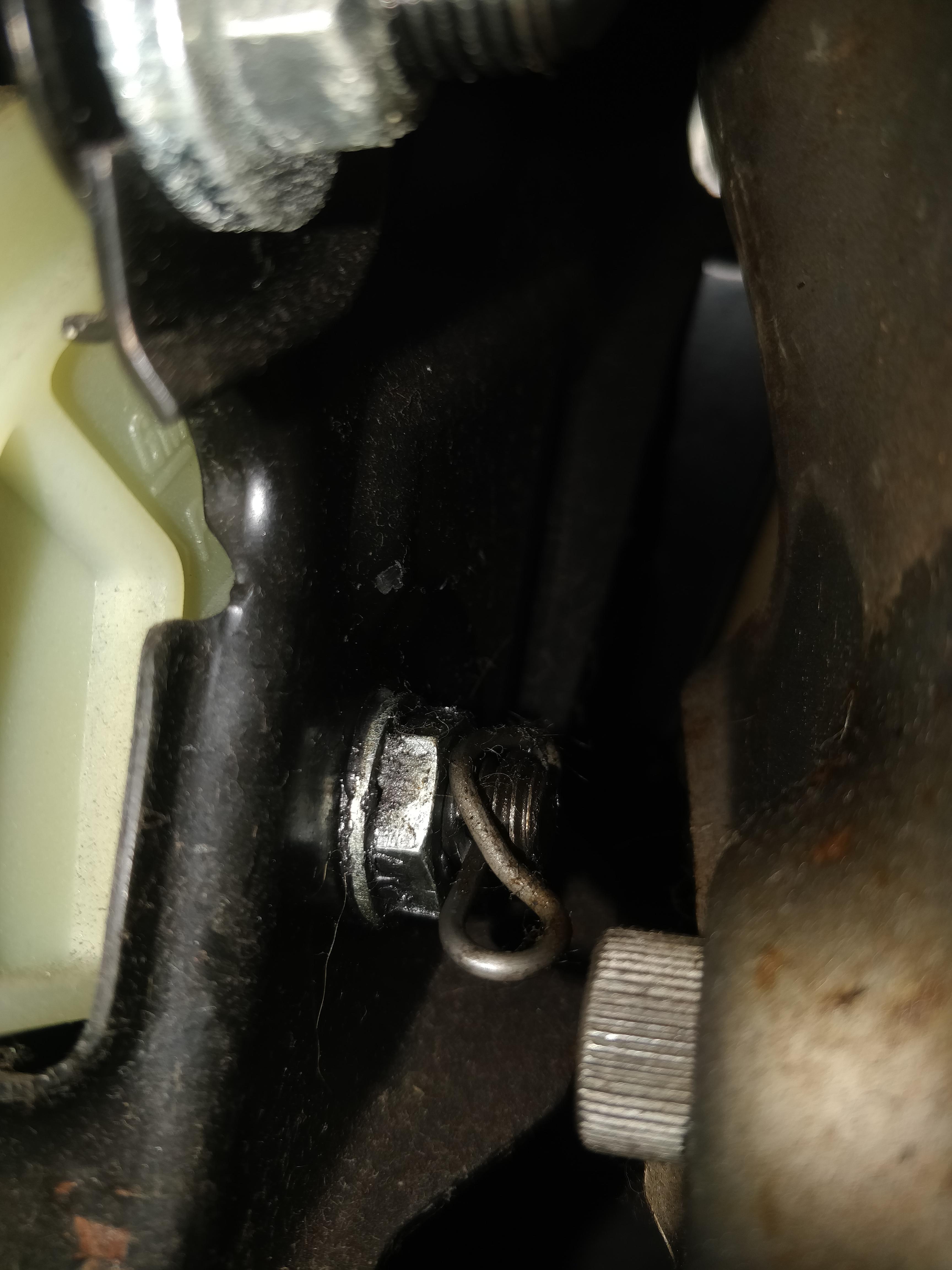 2000 Corsa B 1.0L How do I remove this locking spring so I can remove