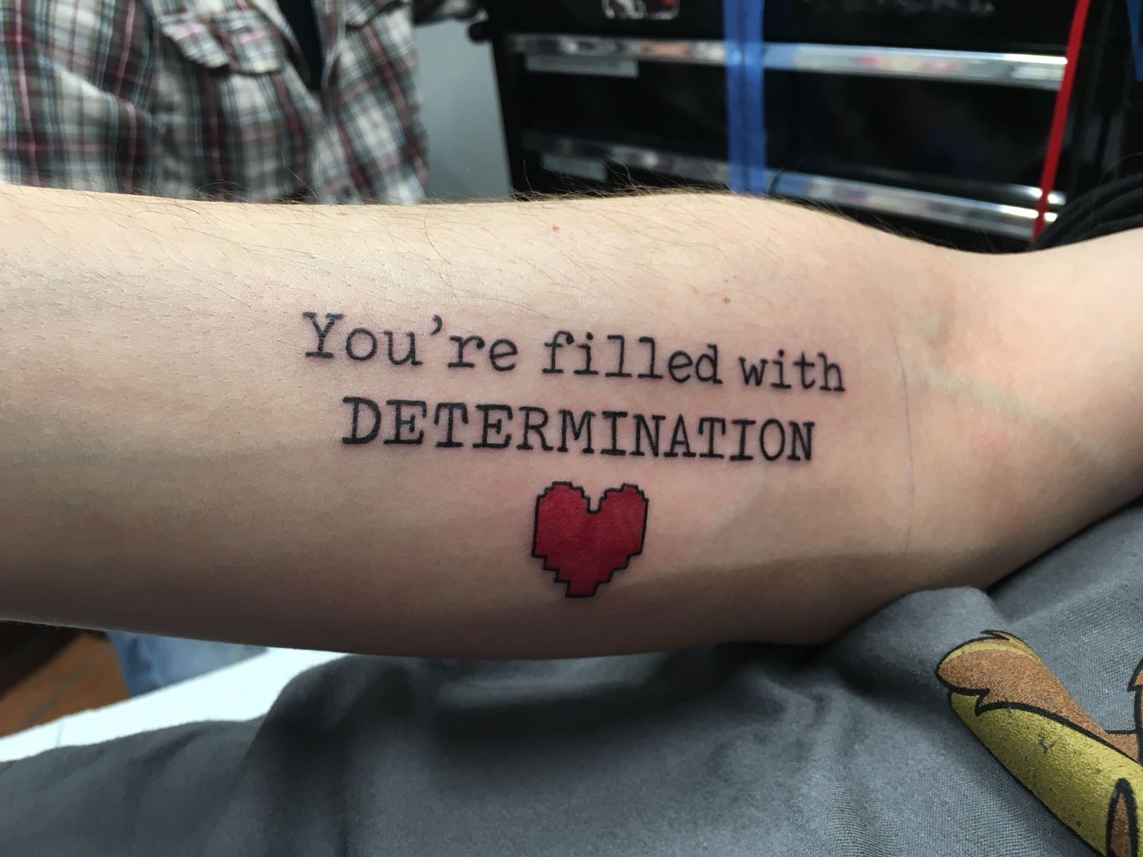A tattoo my buddy just got. Undertale