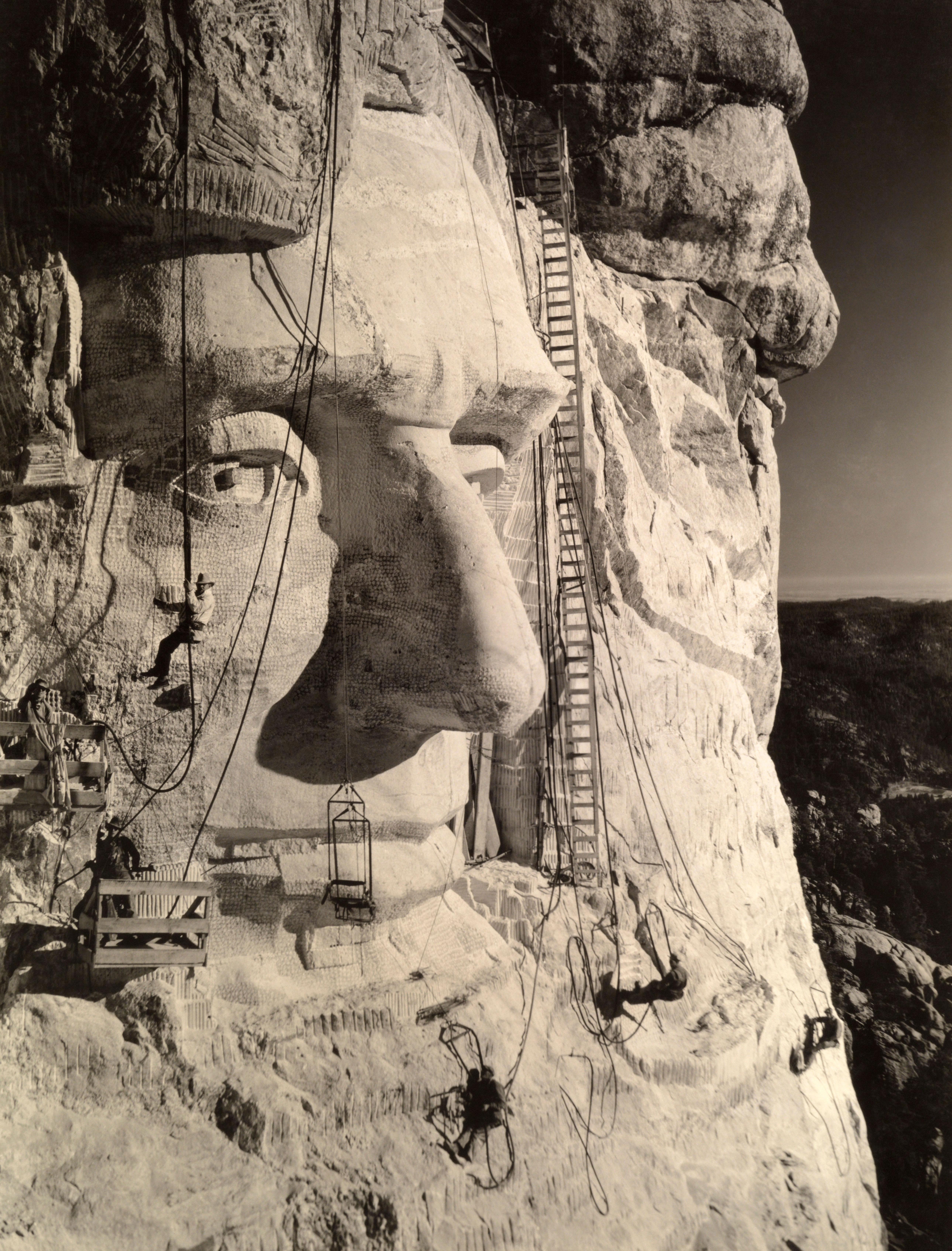 Sculpting begins on the face of Lincoln, Mount Rushmore, Black Hills