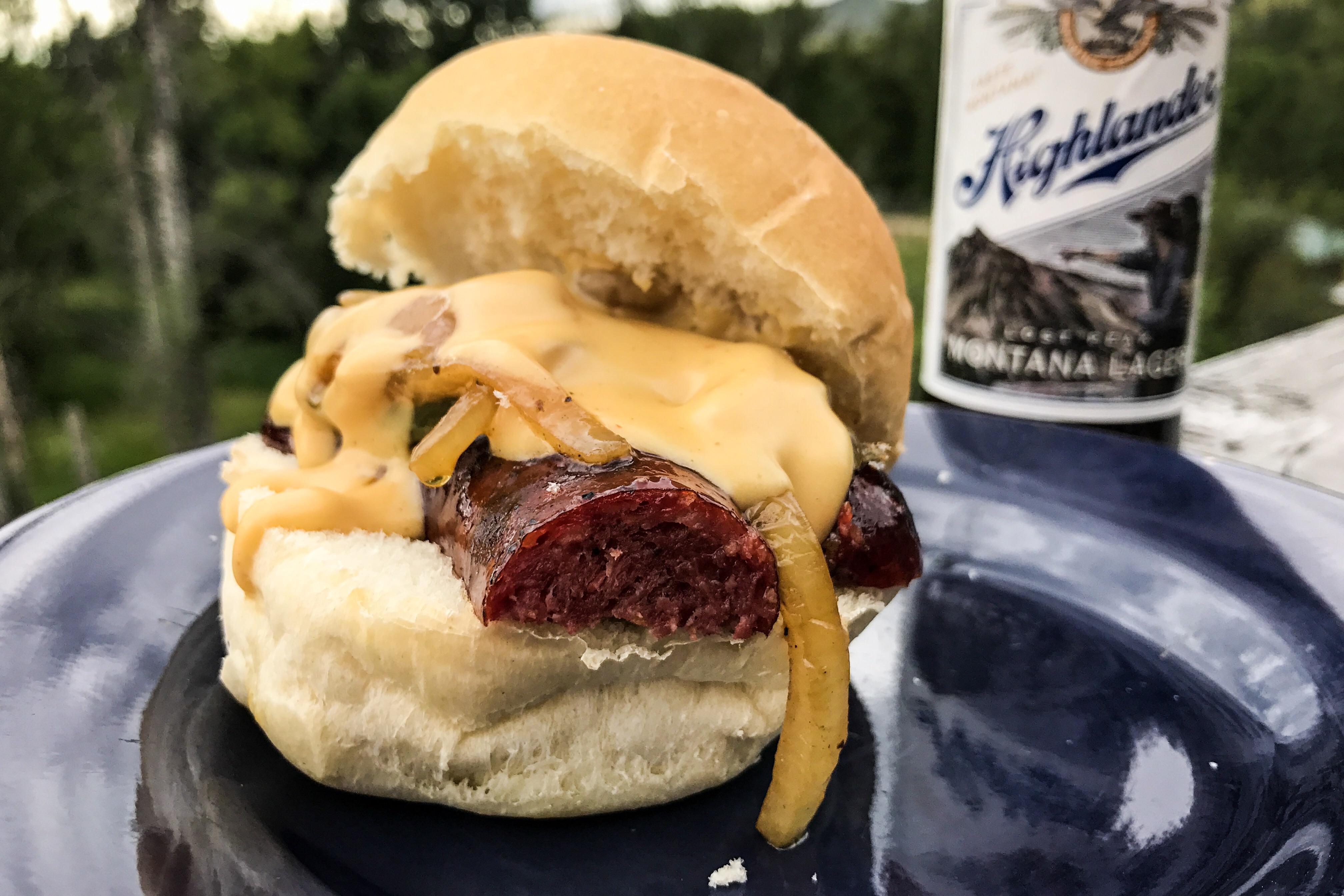 Venison Beer Bratwurst Slider with beerbraised onions & peppers and