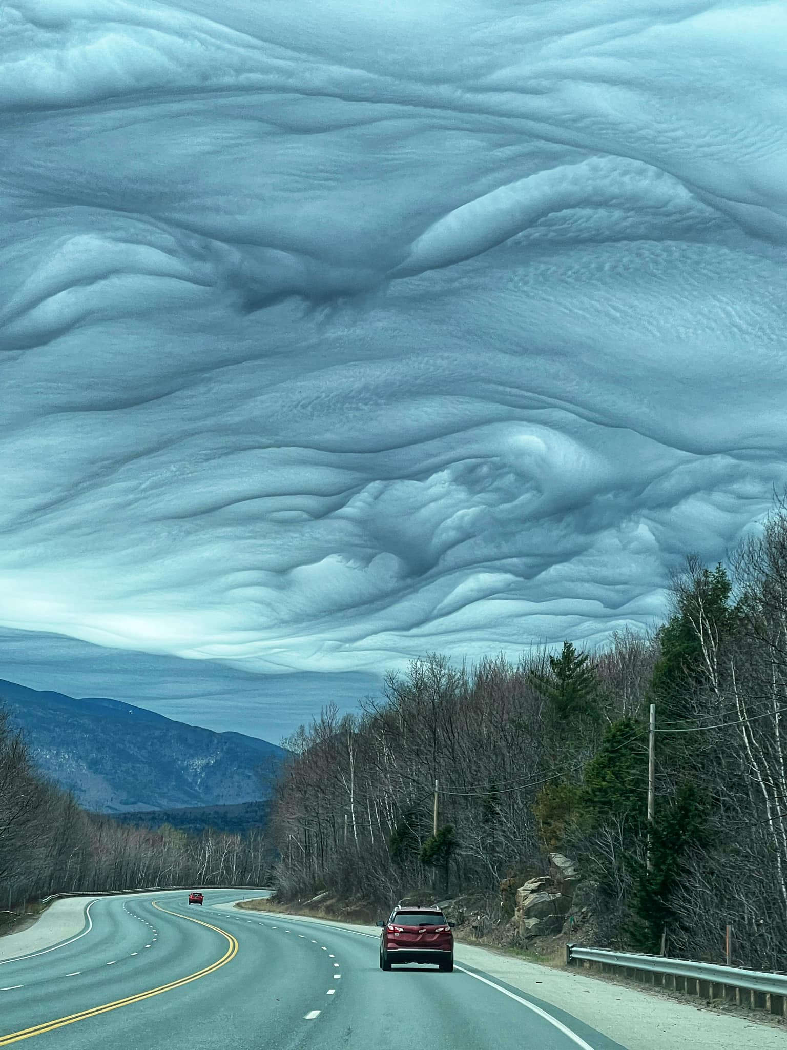 Asperitas clouds today above Gorham New Hampshire r/weather