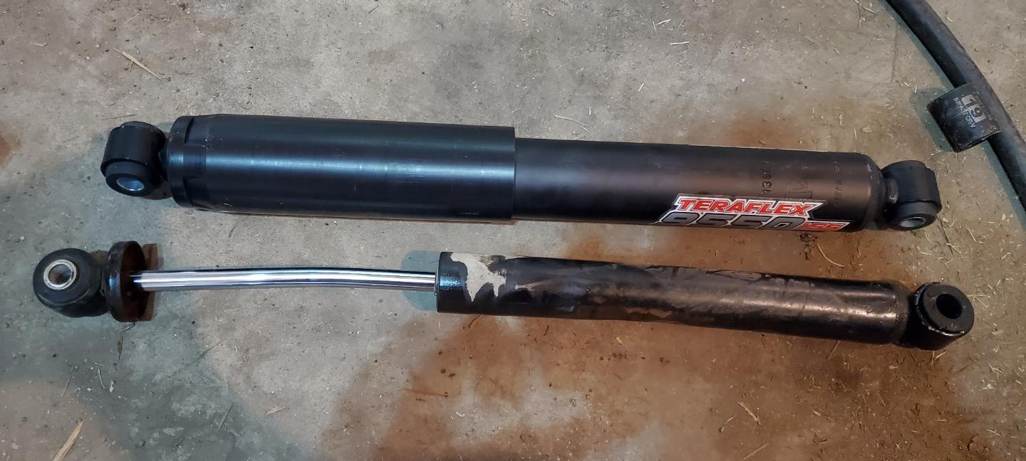 That stock steering dampener was not loving life. Out with the old, in