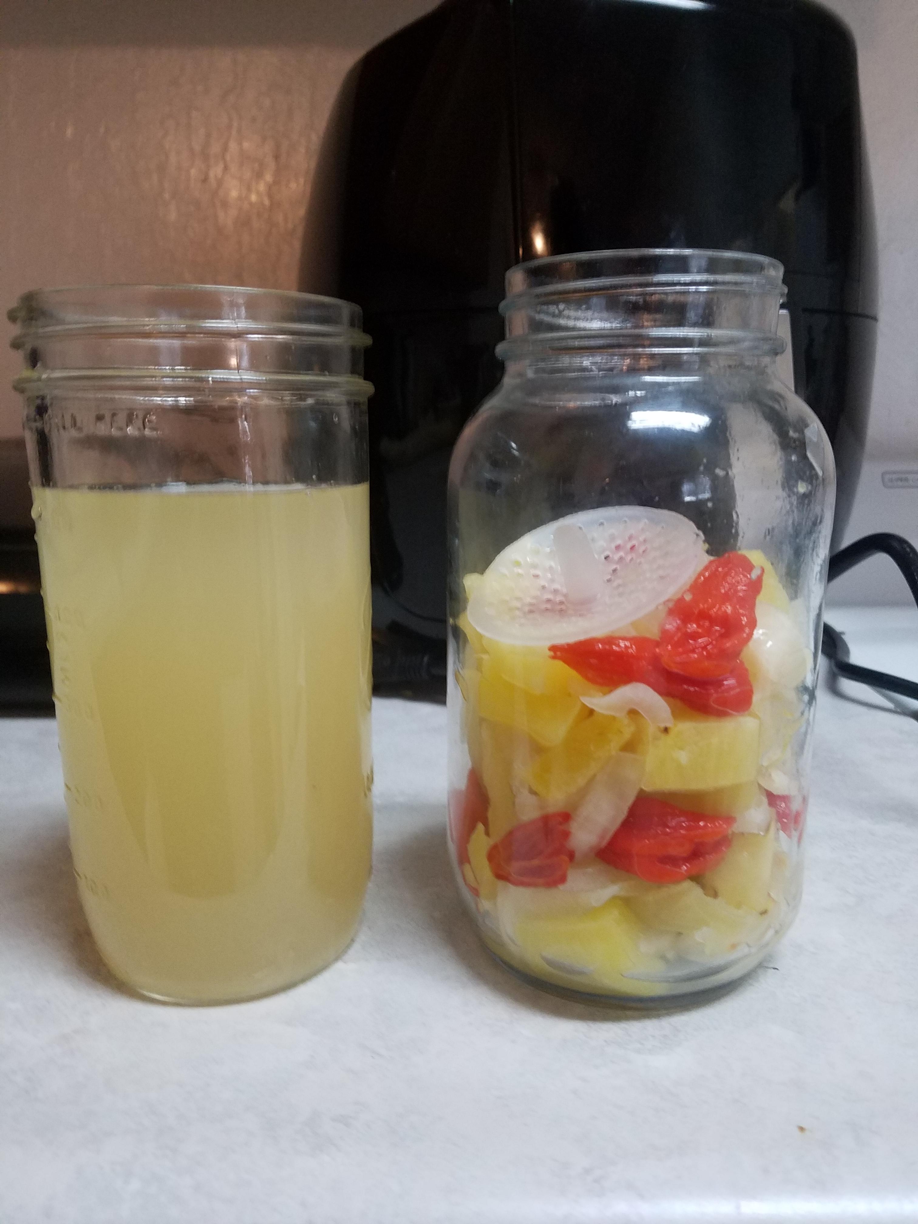 Pour off of my ghost pepper pineapple fermented hot sauce. Love how