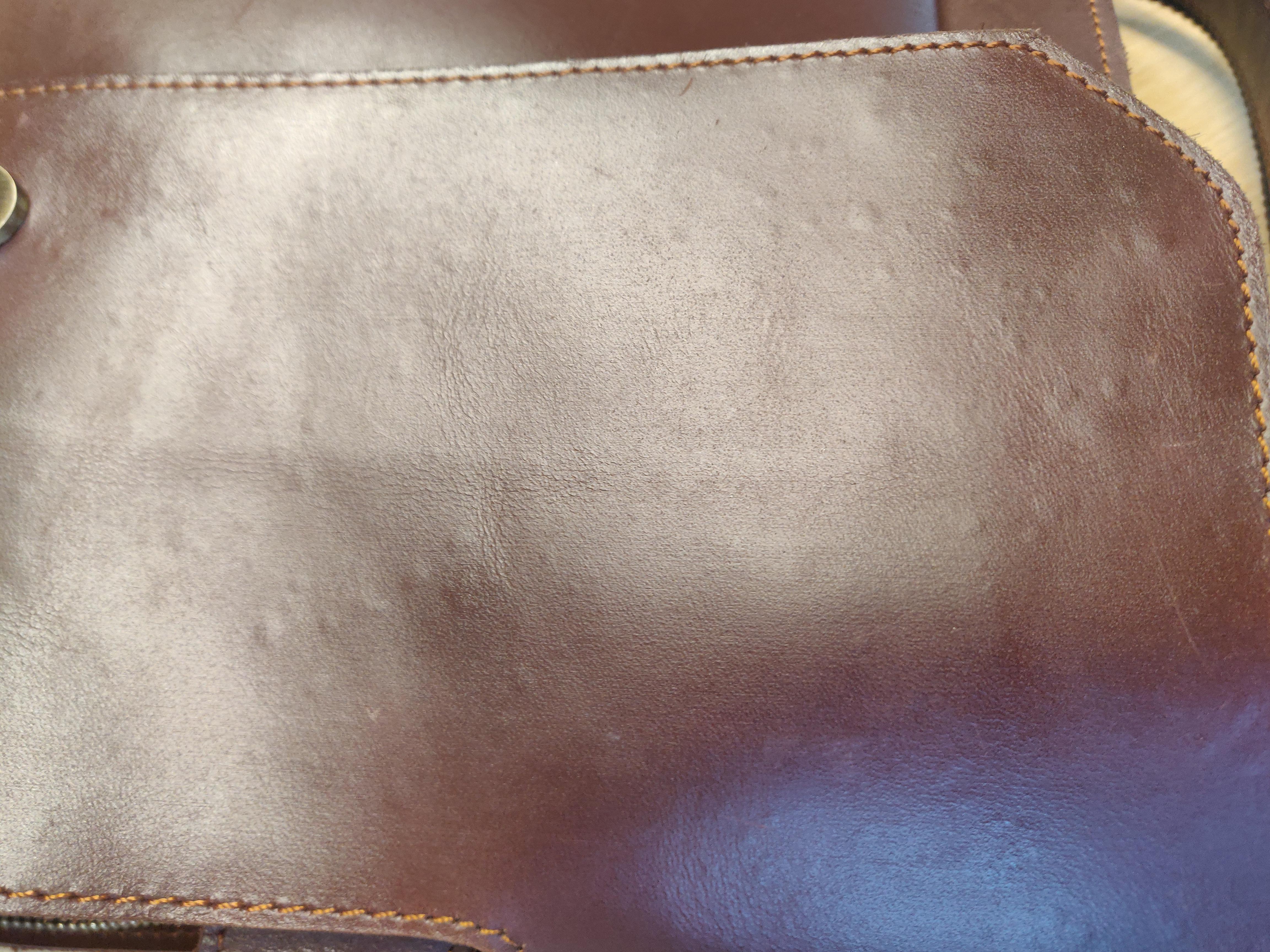 How do i fix bubbles emerging on leather bag? r/Leather