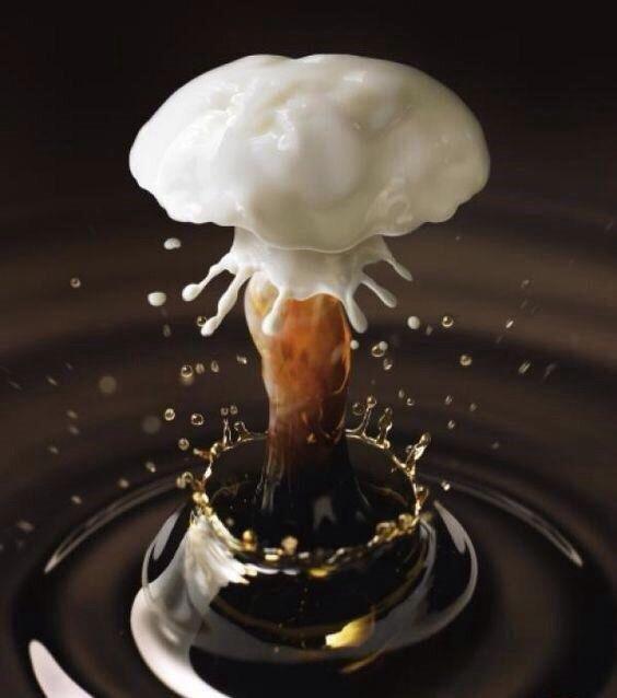 The cream hitting the coffee looks like a nuclear bomb.