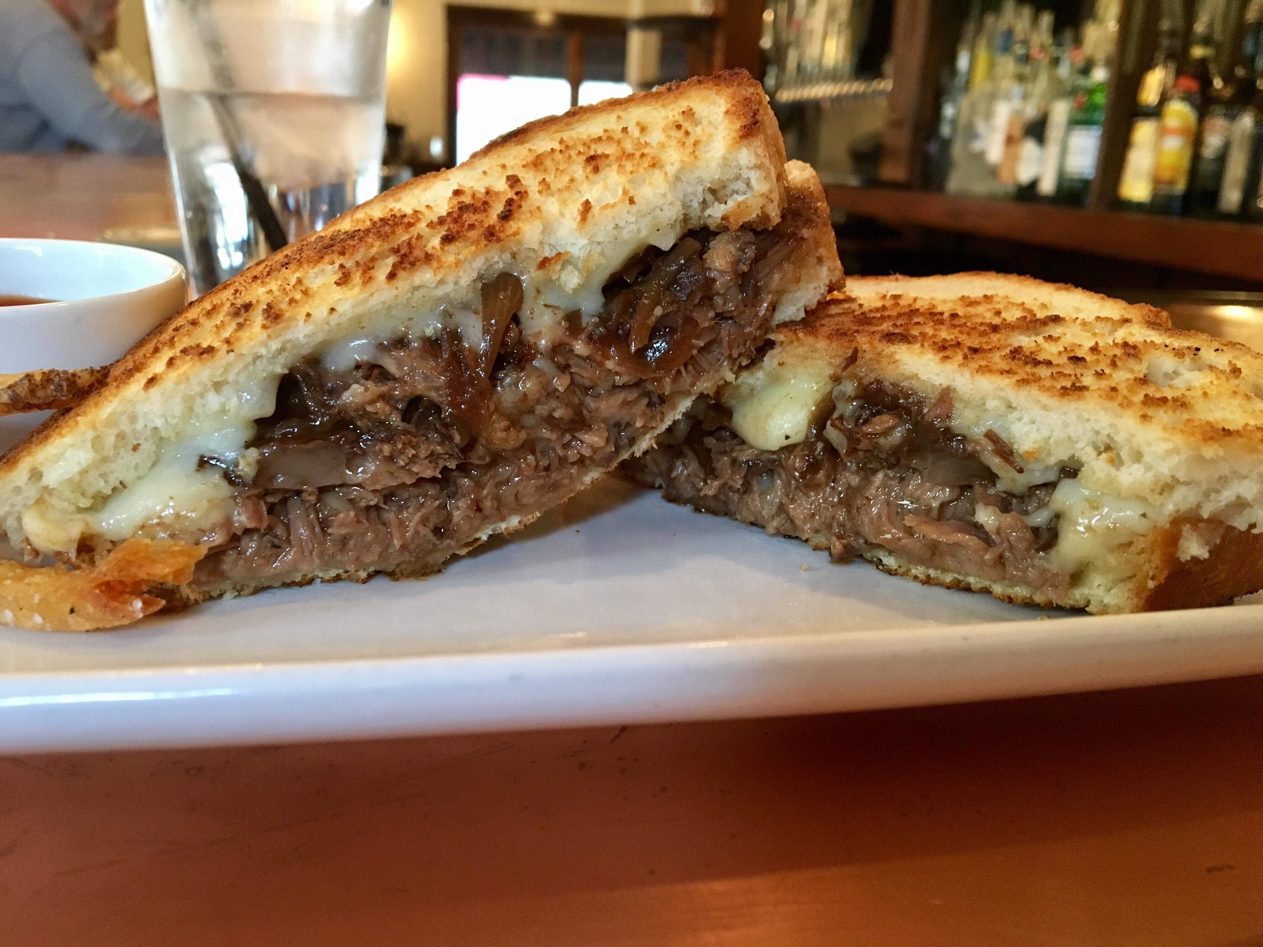 Braised short rib grilled cheese on sourdough with caramelized onions and cheddar. [4032 x 3024
