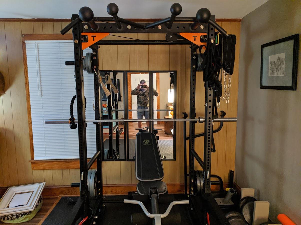 My mini gym in the corner of the den r/homegym