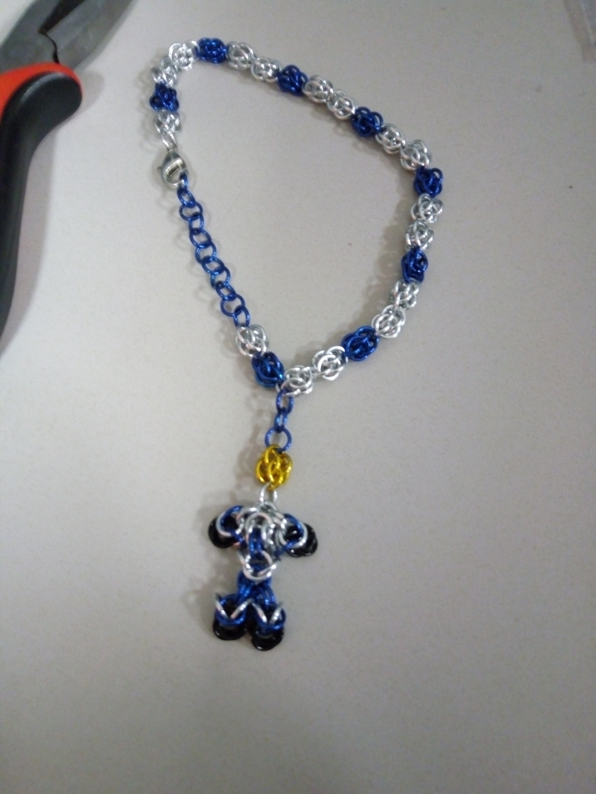 Charm bracelet done as a commission. (For a Toronto Maple Leafs fan) any feedback? r/maille