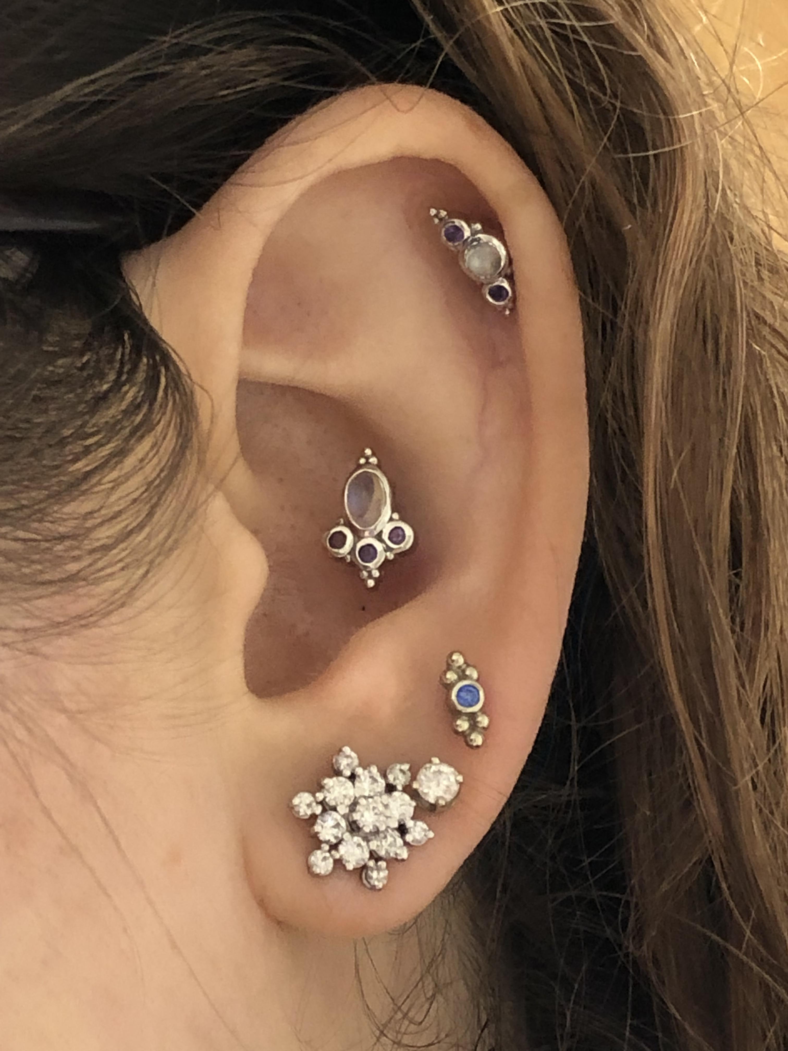 New conch and third lobe done by Jen at Brilliance Piercing. Jewelry in