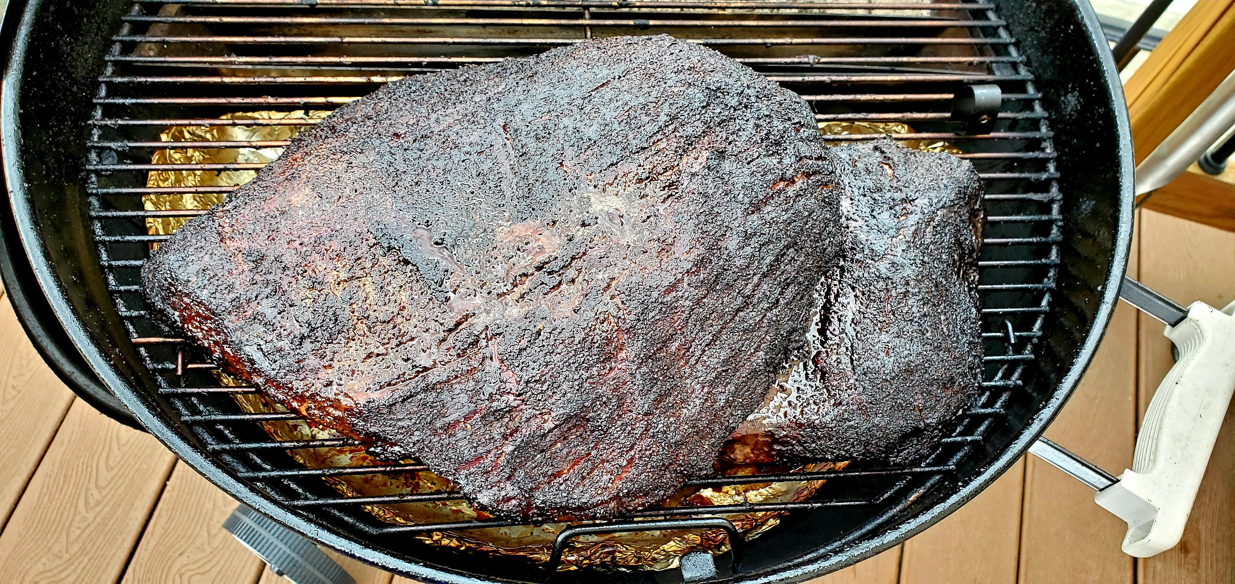 First packer, second brisket. er kettle 22". r/smoking