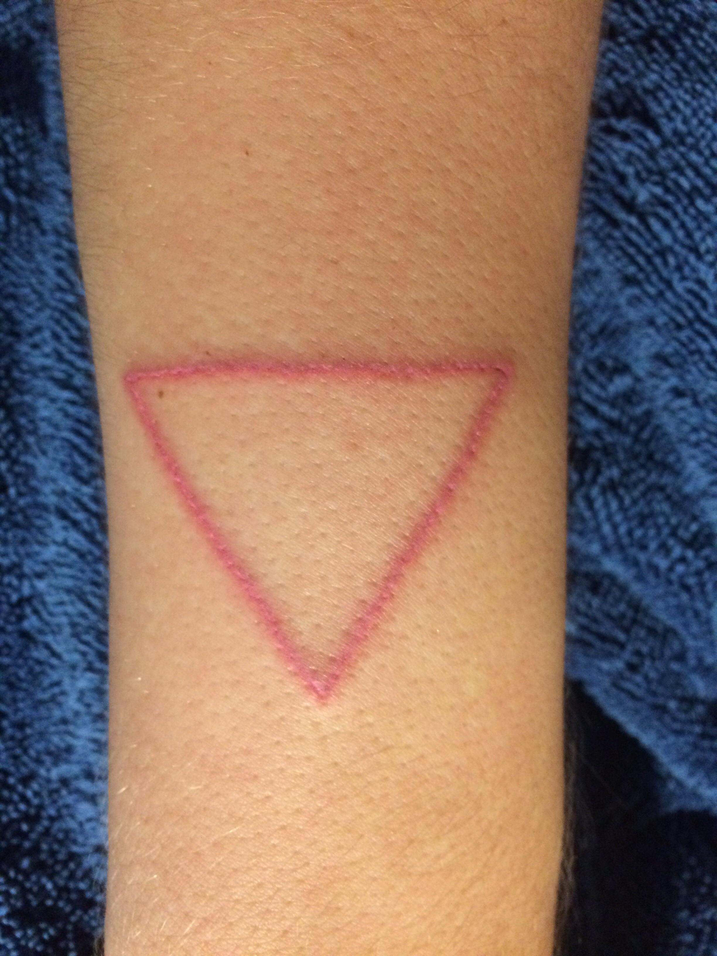 Pink triangle on top of my arm 7rl sticknpokes