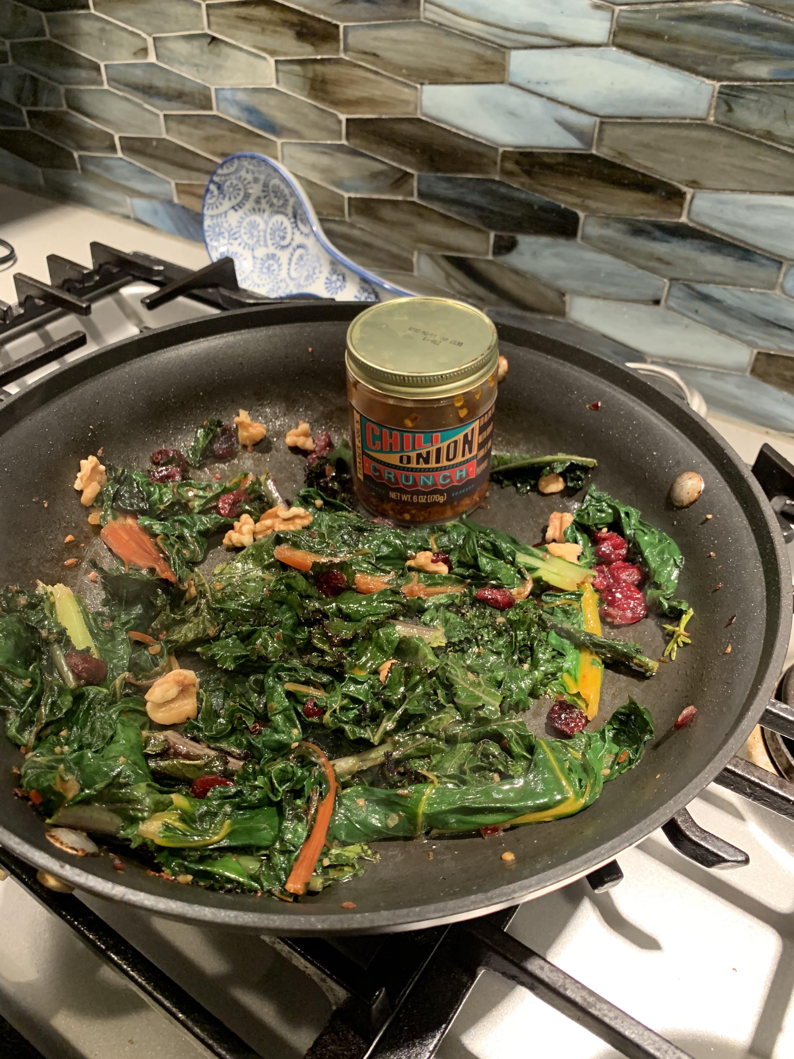Sautéed Swiss chard & kale in TJ onion crunch, with walnut and dried