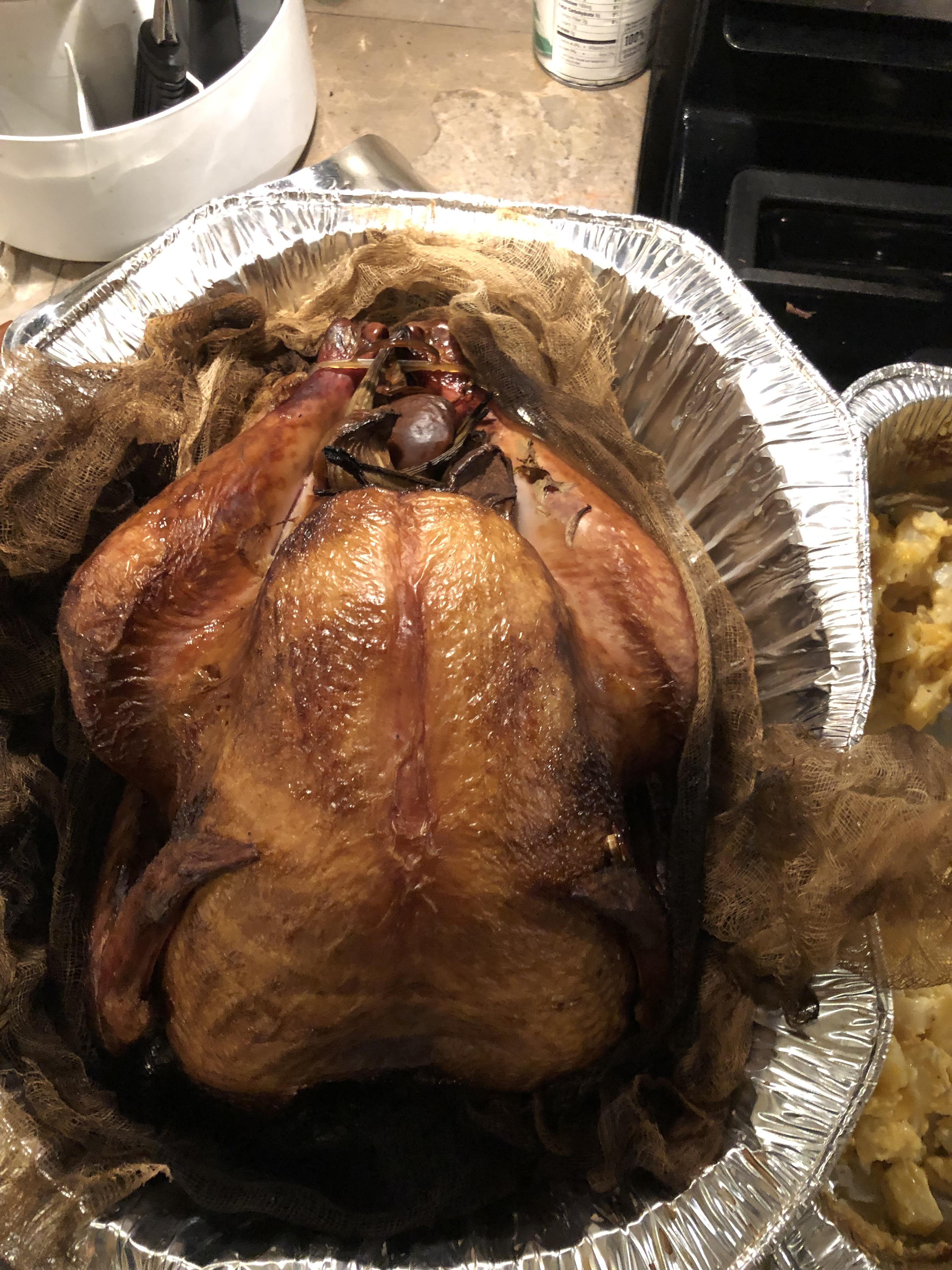 Smoked my first turkey. Turned out pretty. Wrapped it in cheesecloth to