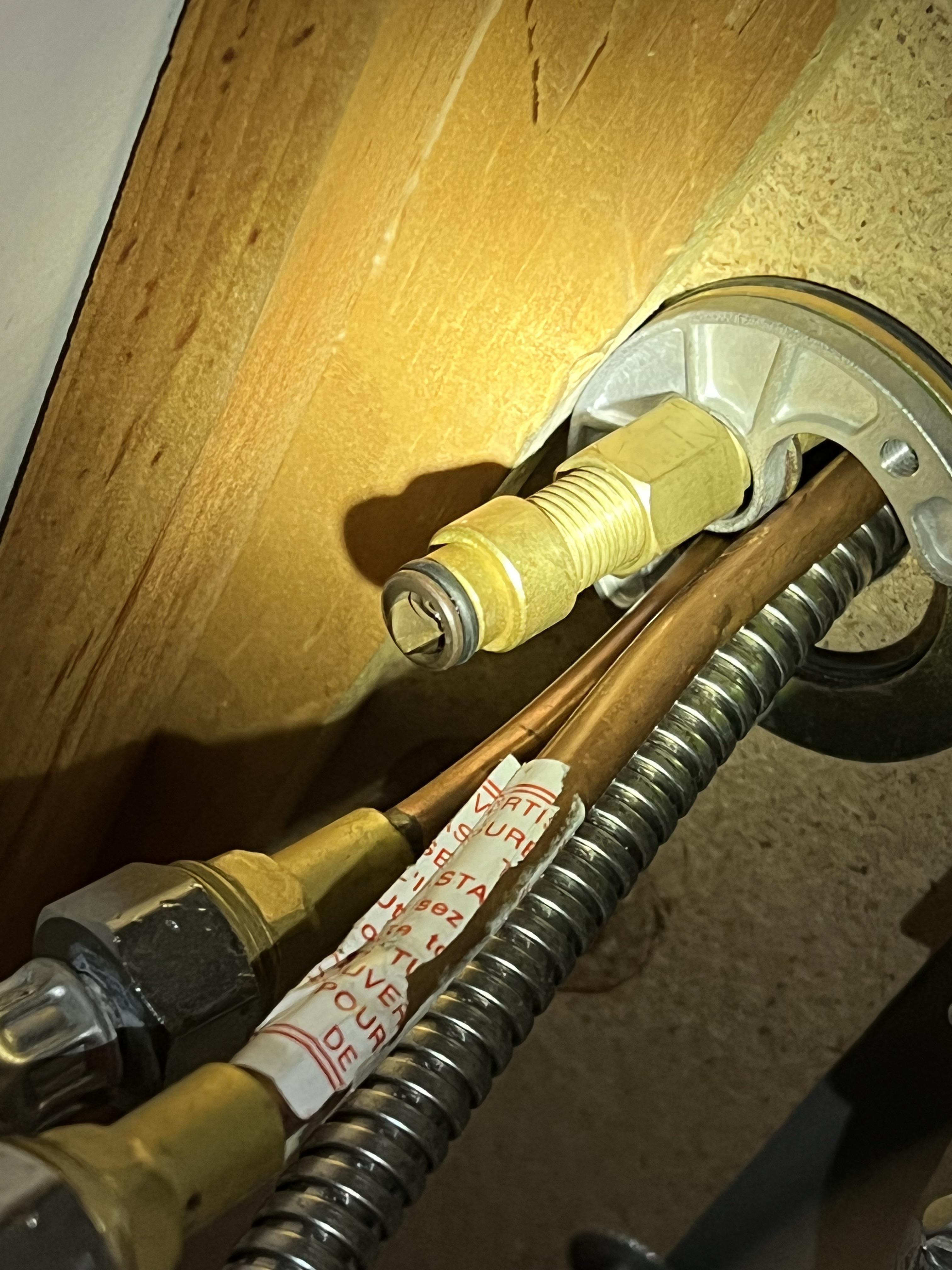 Any idea how to remove this kitchen faucet? Below the counter there is