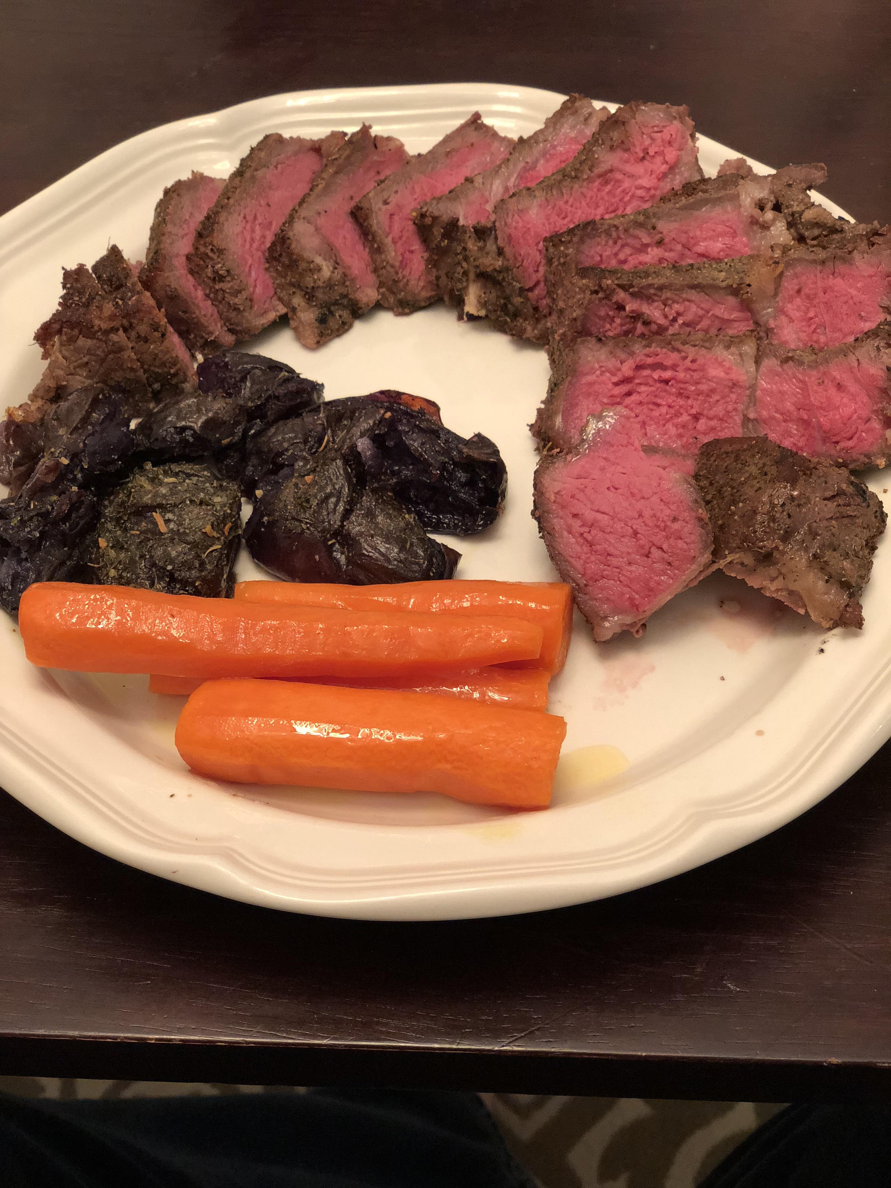 Sous Vide NY Strip and Honey Carrots, with smashed purple potatoes. r