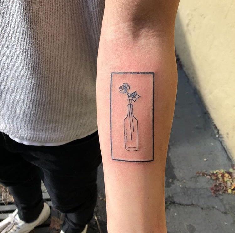 Flowers in a bottle by Stevi Beets, Skin and Soul in Bellevue, WA tattoos