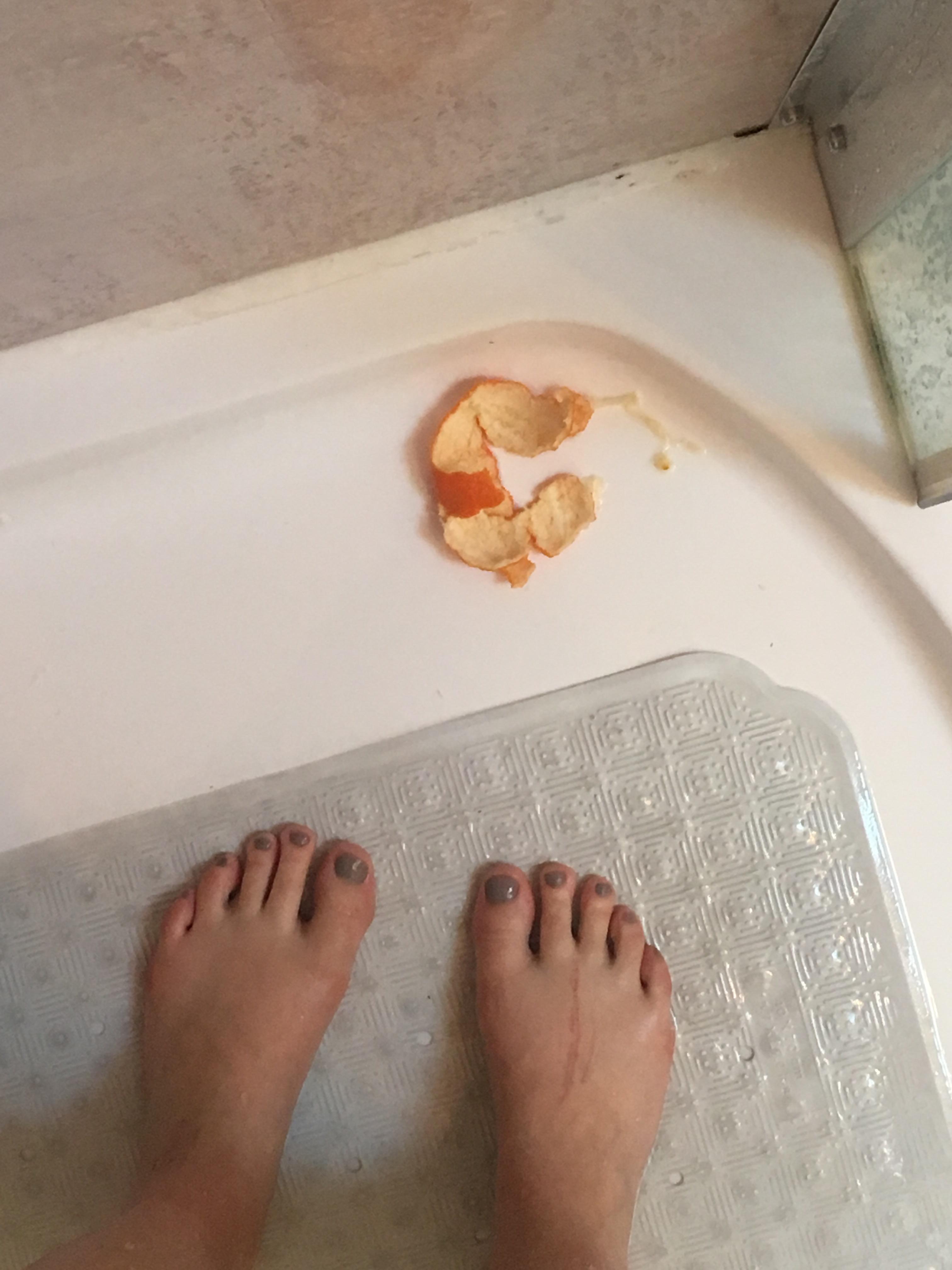 I went in the shower an orange eating girl, I left the shower a shower