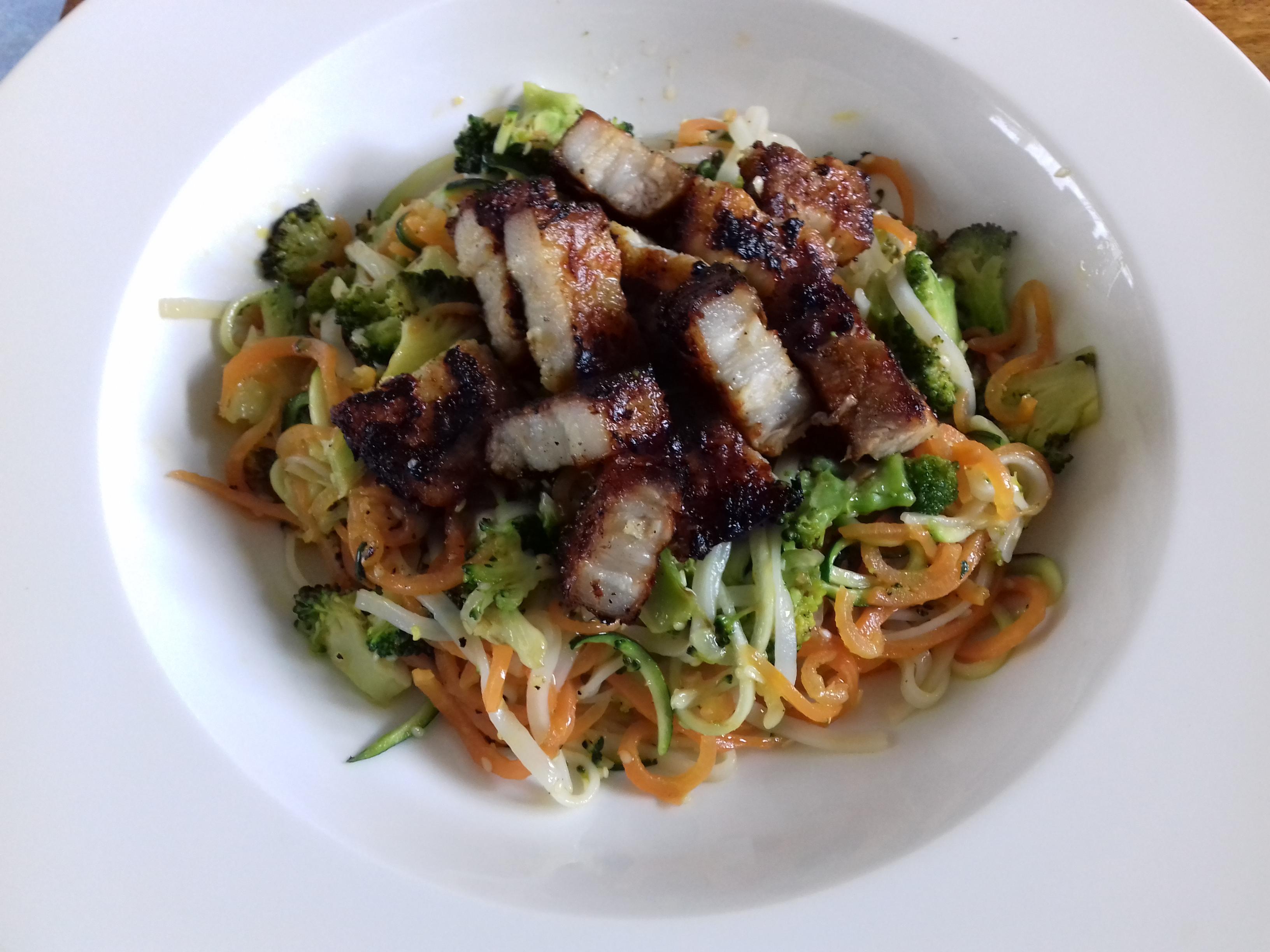 Pork belly with stir fry rice noodles, carrot and courgette noodles