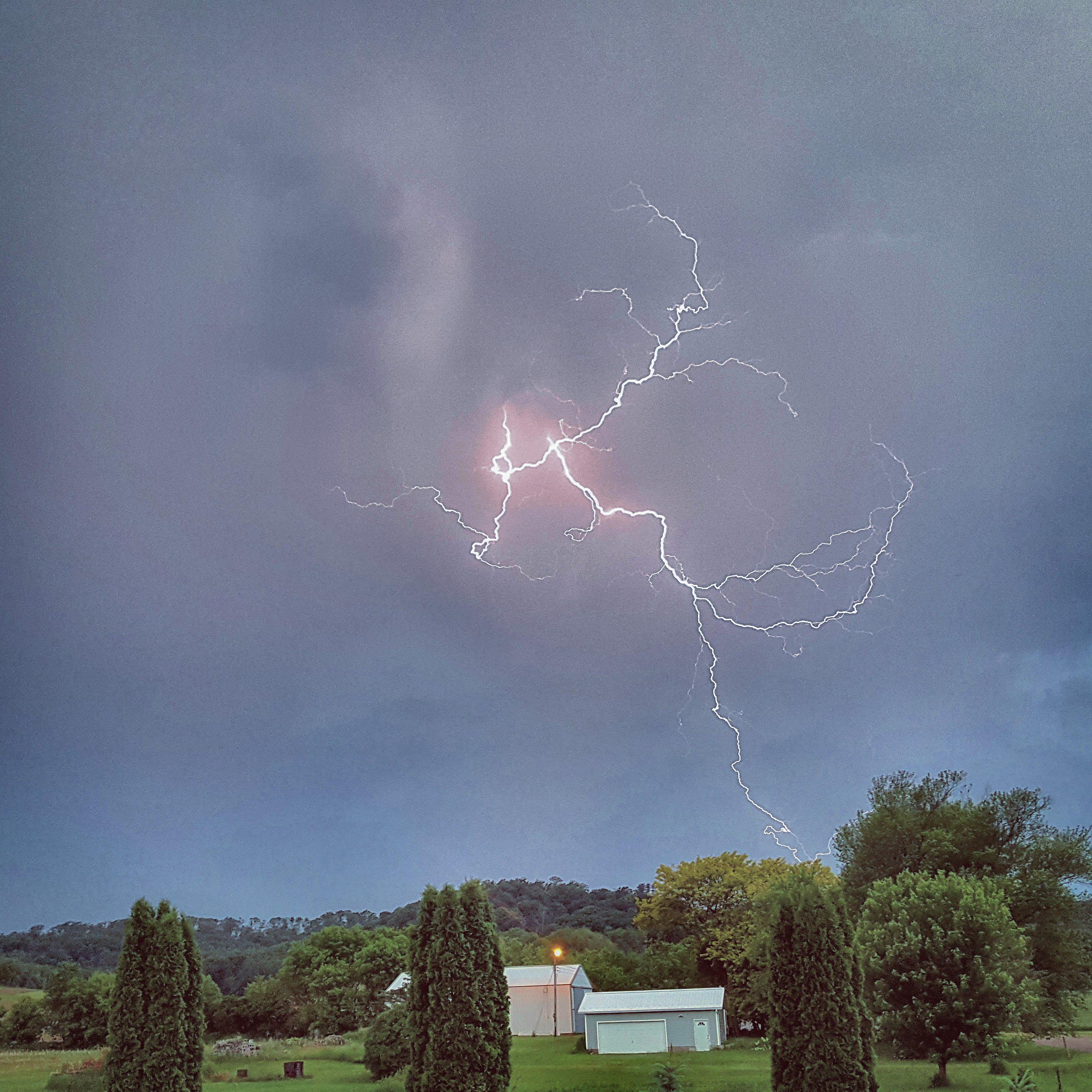 Early morning lightning bolt at my grandparents farm in Wisconsin. r