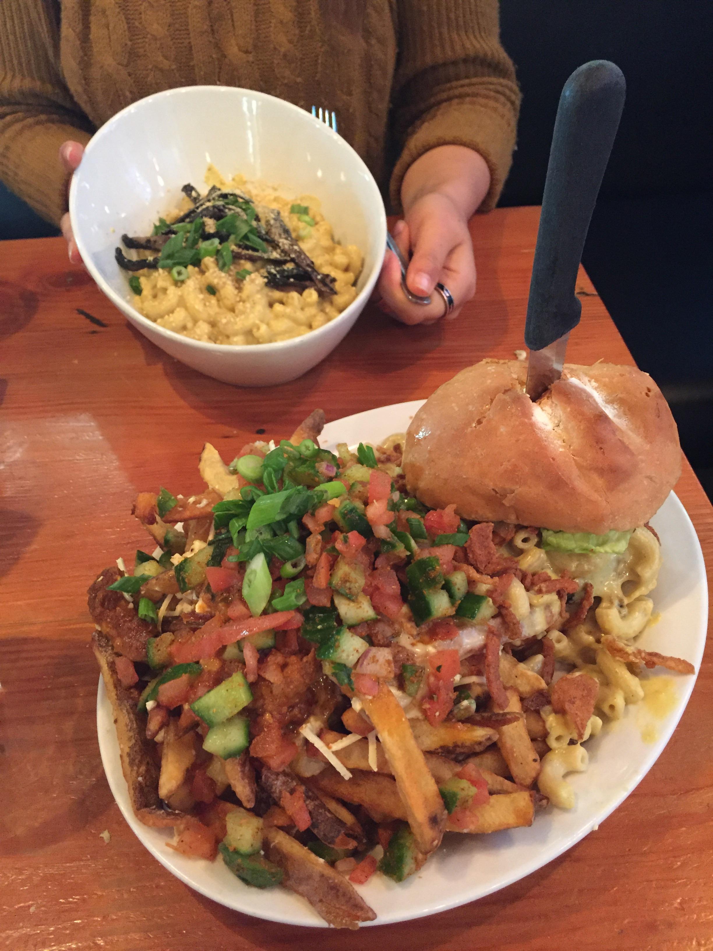 Vegan Mac n cheese burger with butter chicken poutine and portobello Mac and cheese! MeeT in