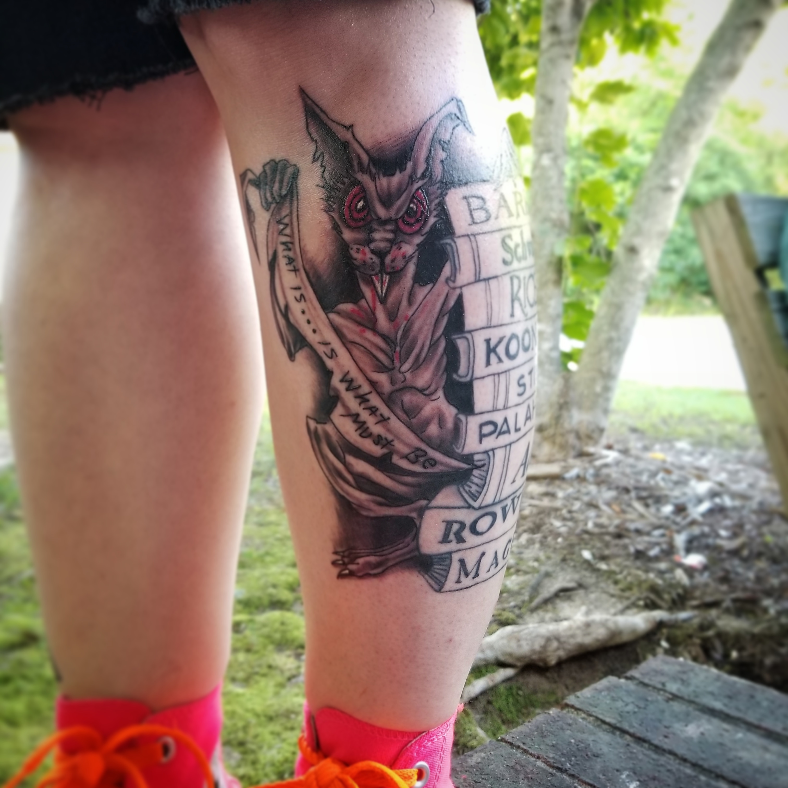 Watership Down inspired tattoo. The banner is being ripped