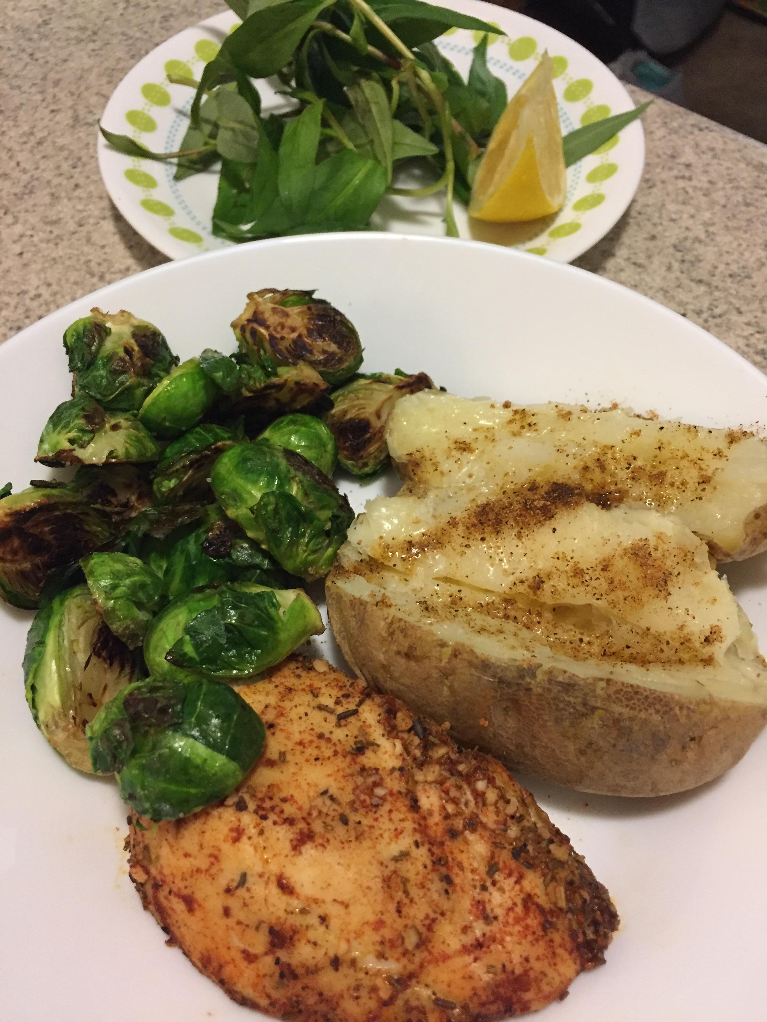 Super filling dinner of rosemary roasted chicken, baked potato, roasted