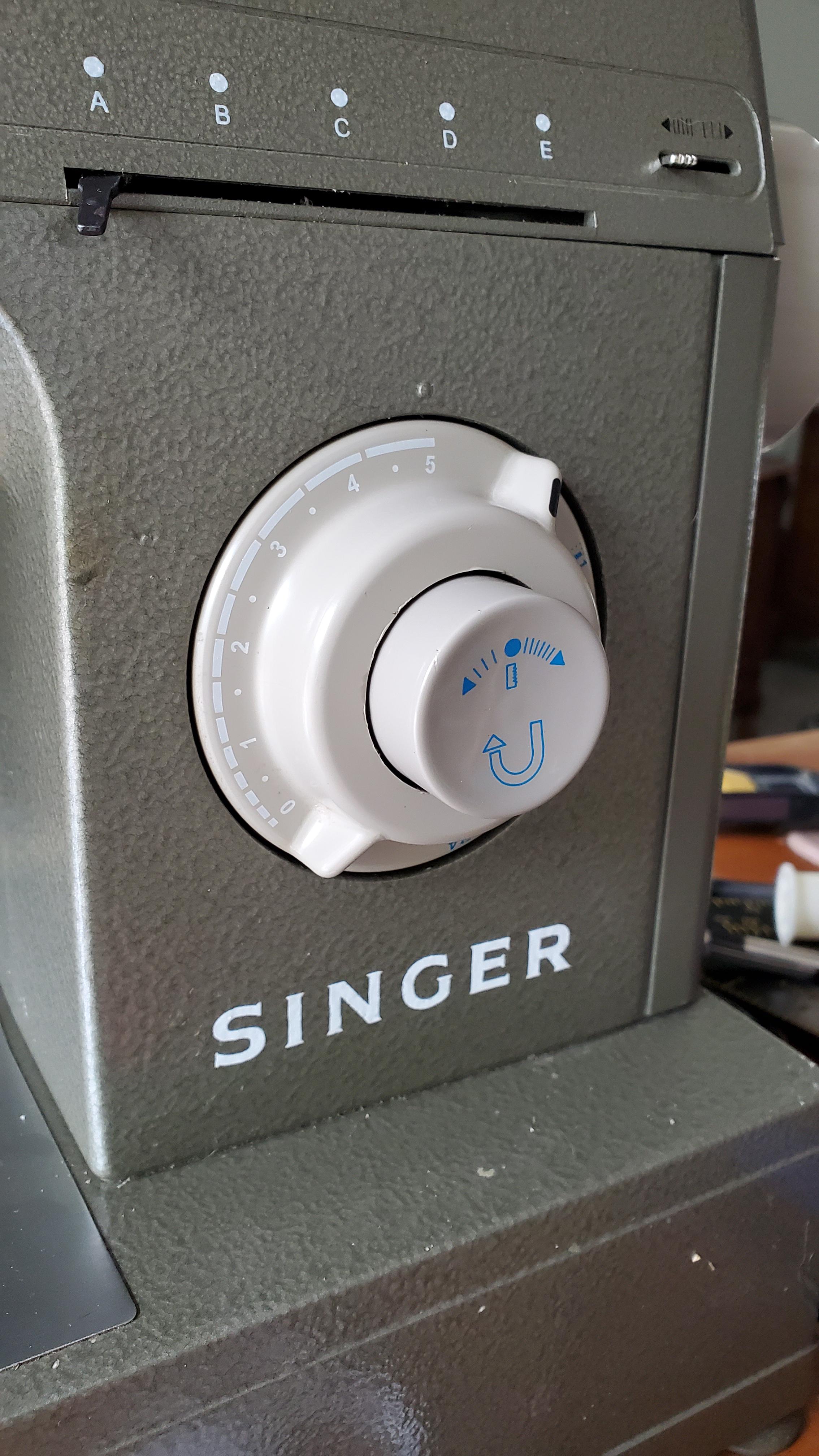 Singer hd110, when changing the stitch it also pulls the reverse button
