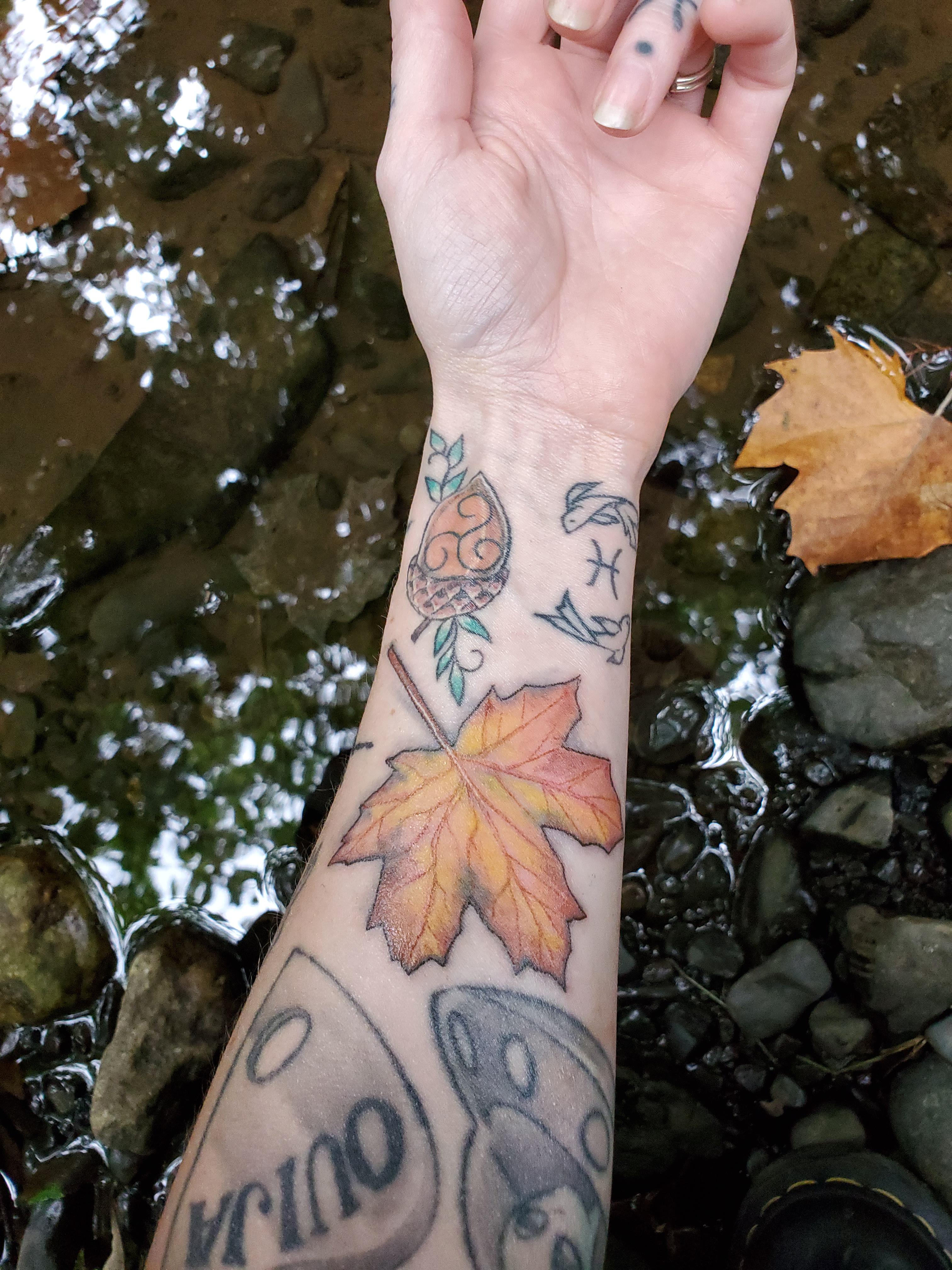 Got my Autumn leaf tattoo touched up and it's so much brighter now
