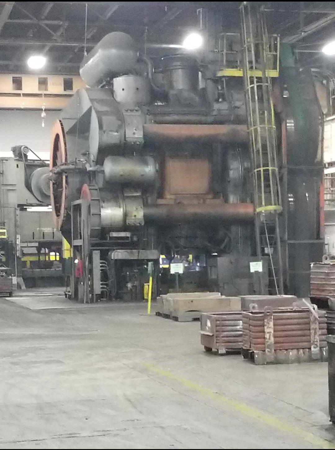 12,000 ton mechanical press. Largest in North America. r