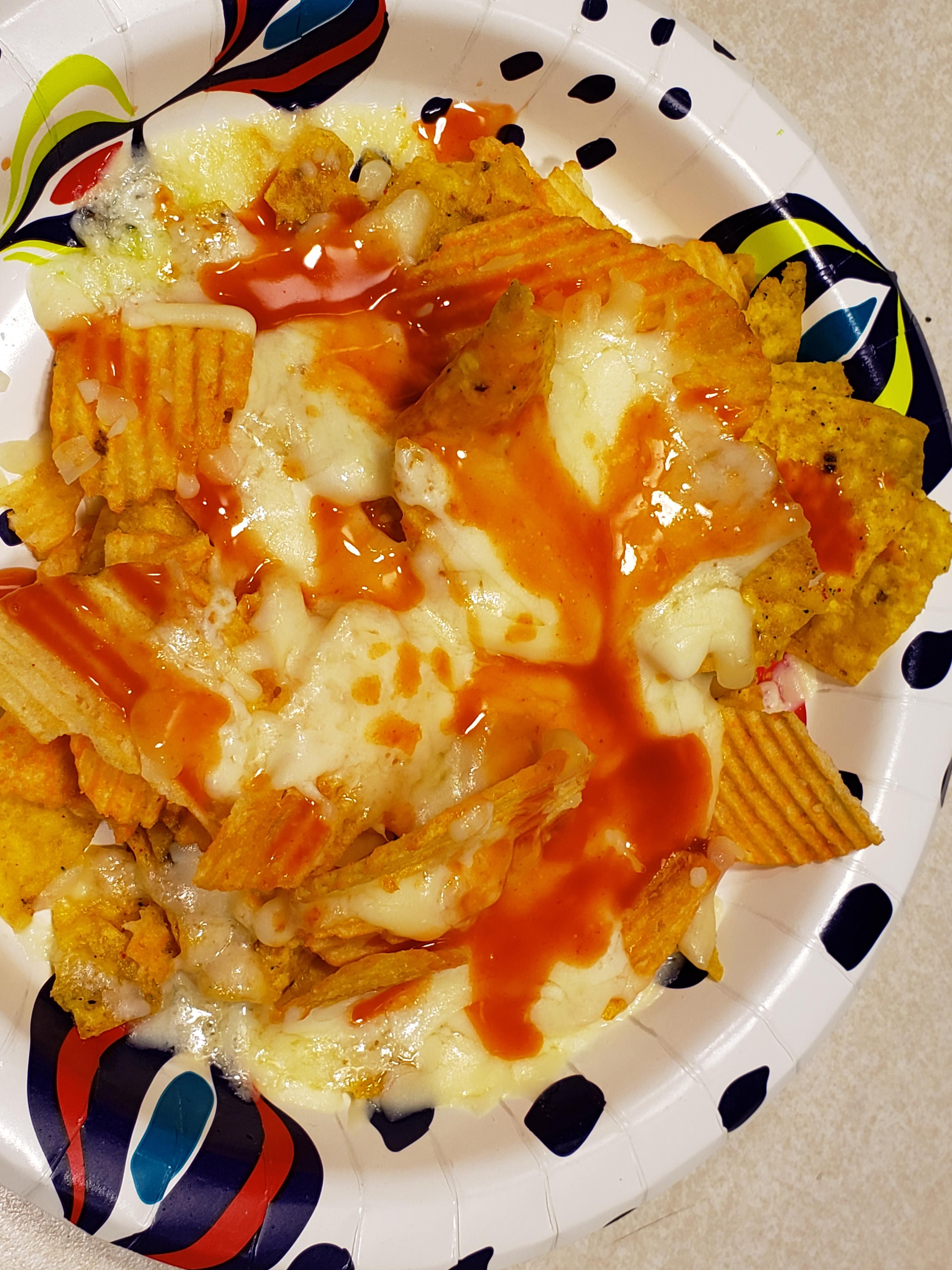 A fuse of Cool Ranch Doritos and Cheddar and Sour Cream Ruffles topped with a blend of