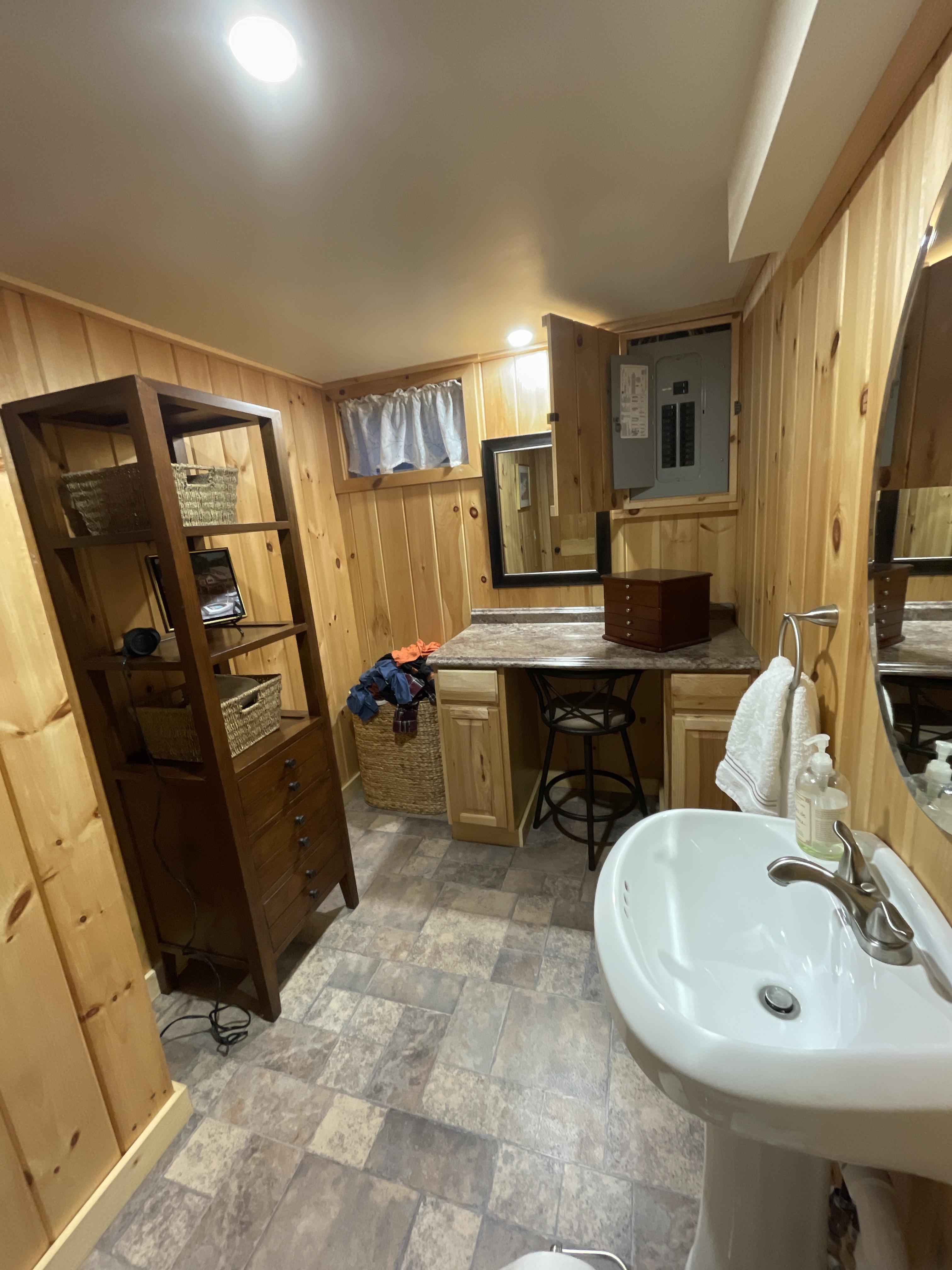 Electrical Panel in Bathroom. I want to add a shower. Can I simply have