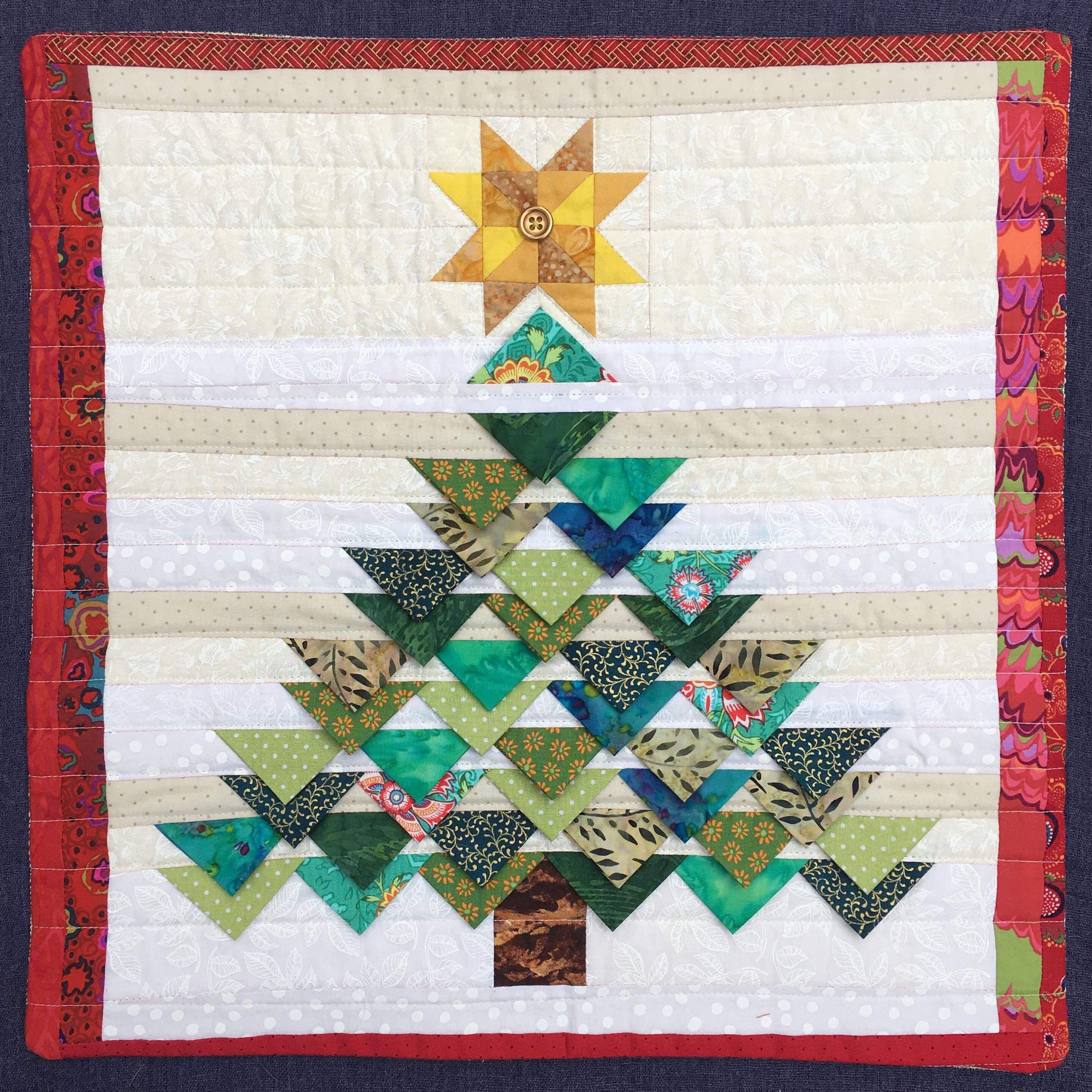 First time doing prairie points for a set of of quilted Christmas