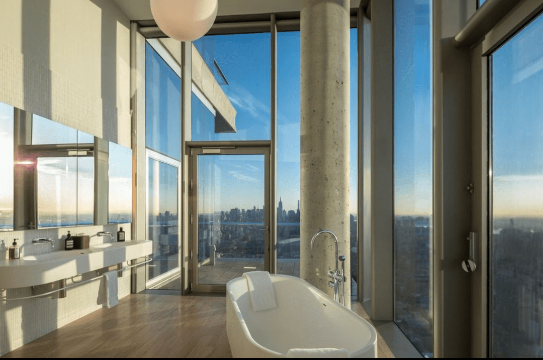 Bathroom with breathtaking views of NYC [1080x1920] r/RoomPorn