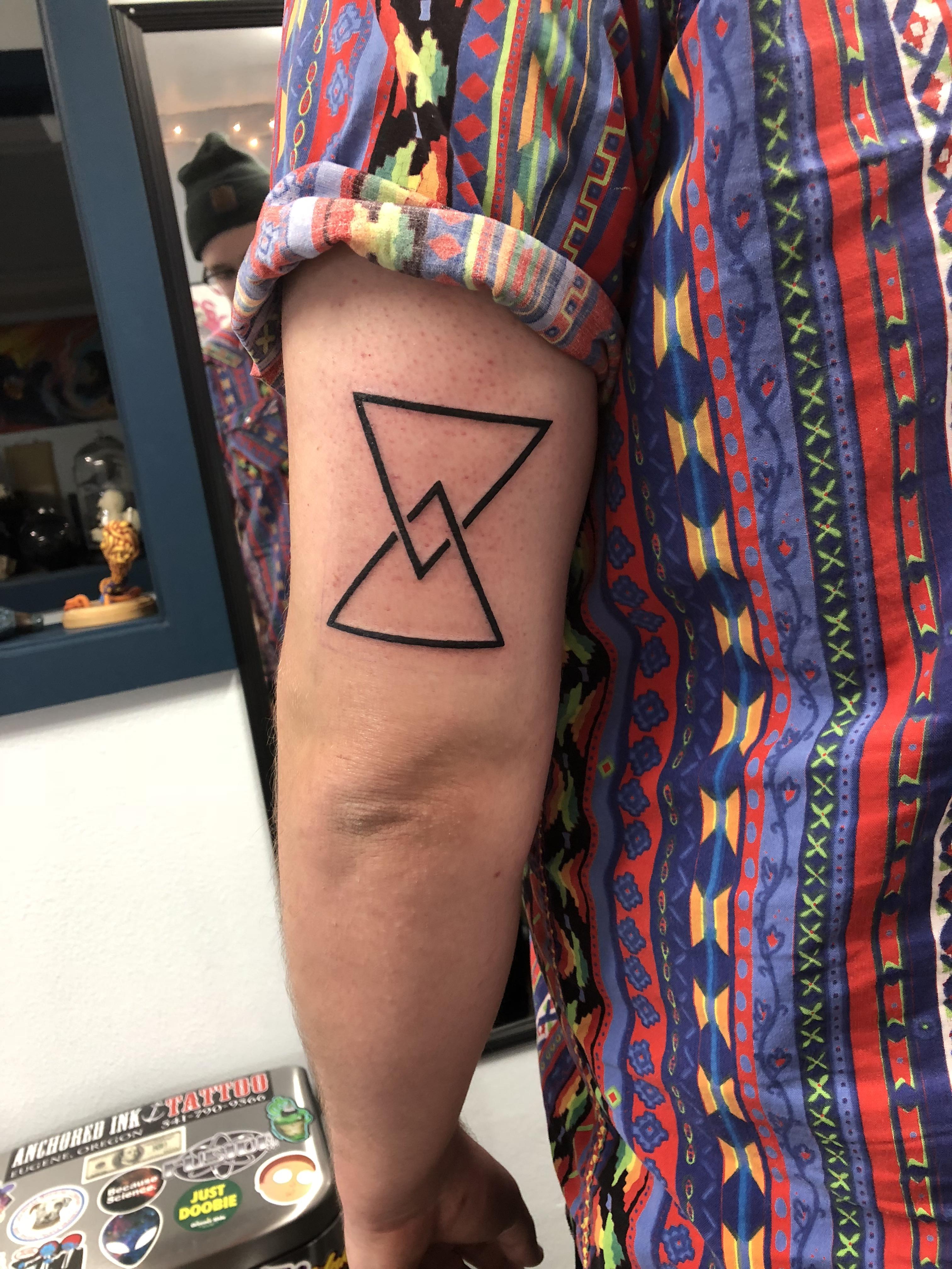 My first Coheed tattoo. Getting it filled in with a