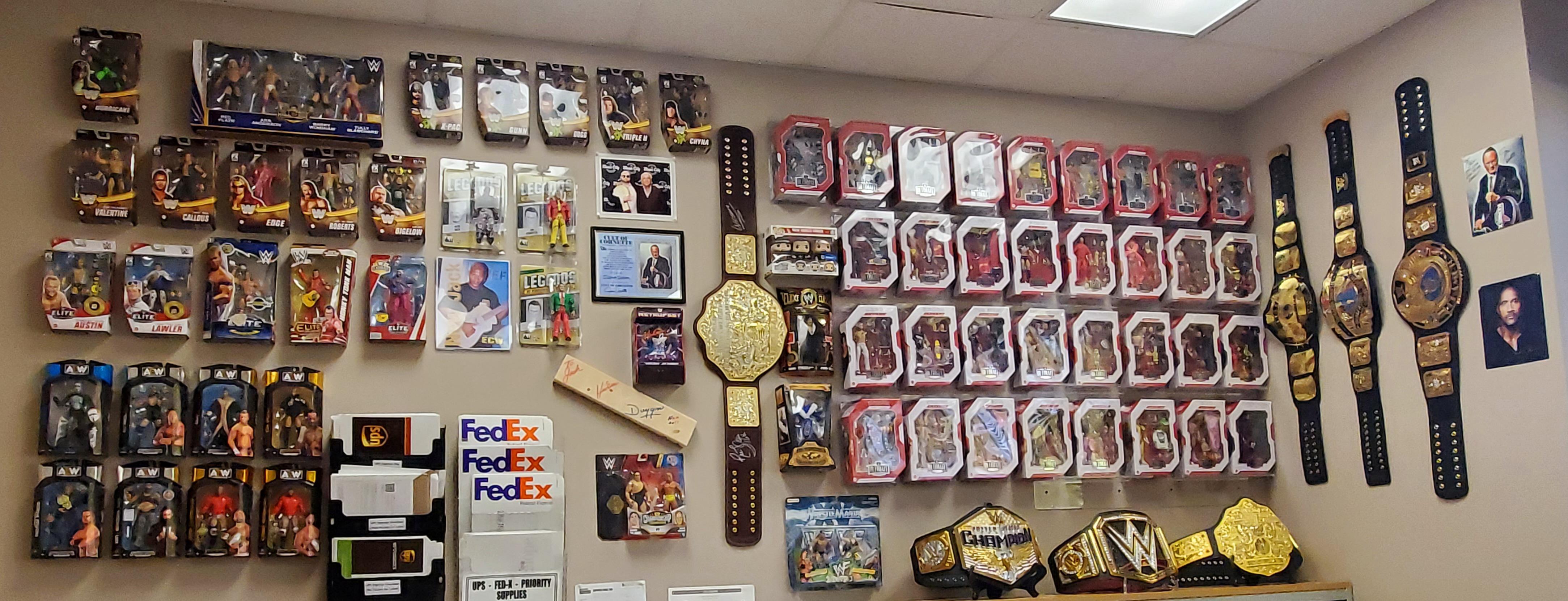 My wrestling wall in my office at work. r/SquaredCircle