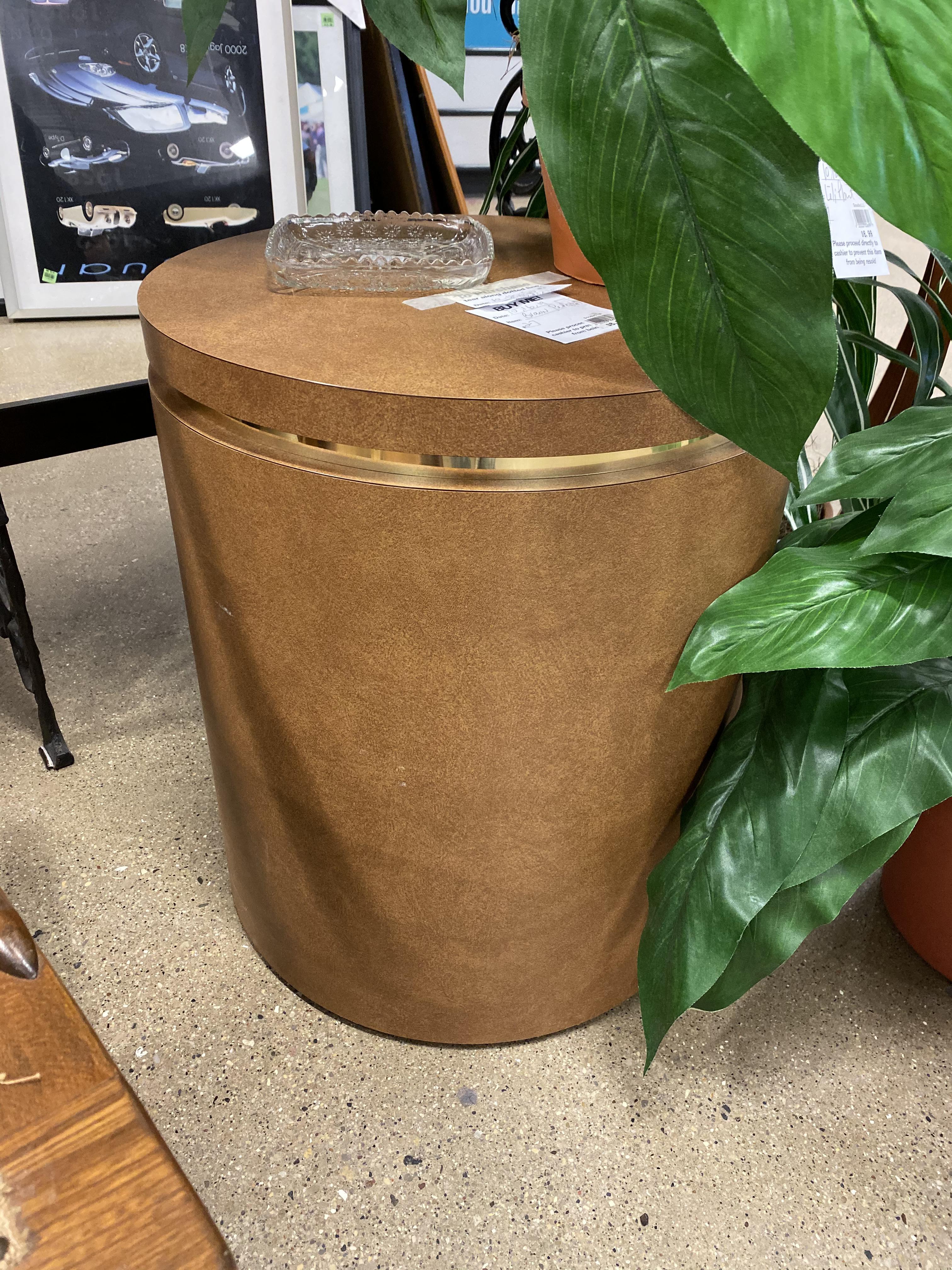 Vintage Round end table with brass accent. It only cost 6.99 r