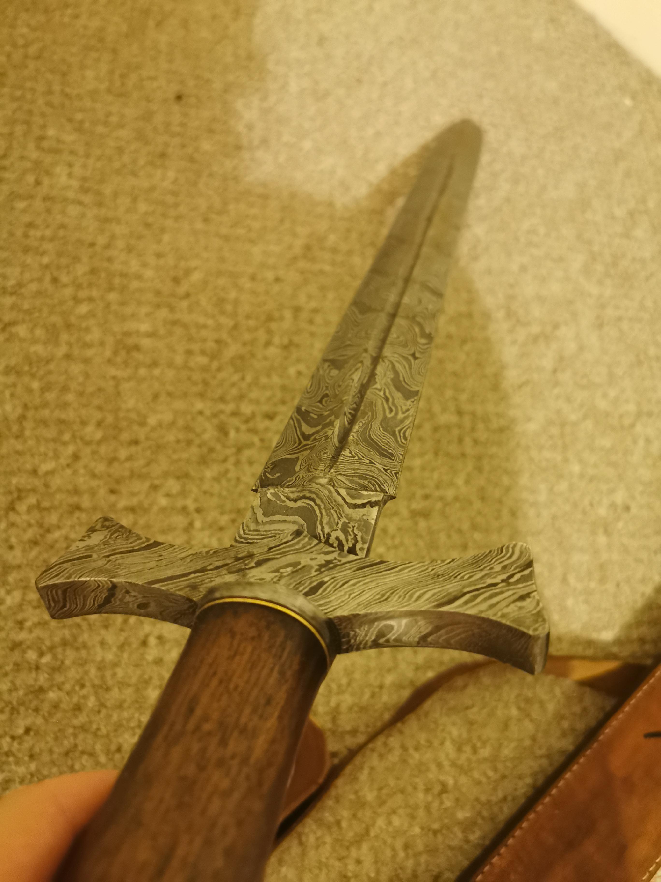 My hand damascus steel sword, probably lame but I love it! r