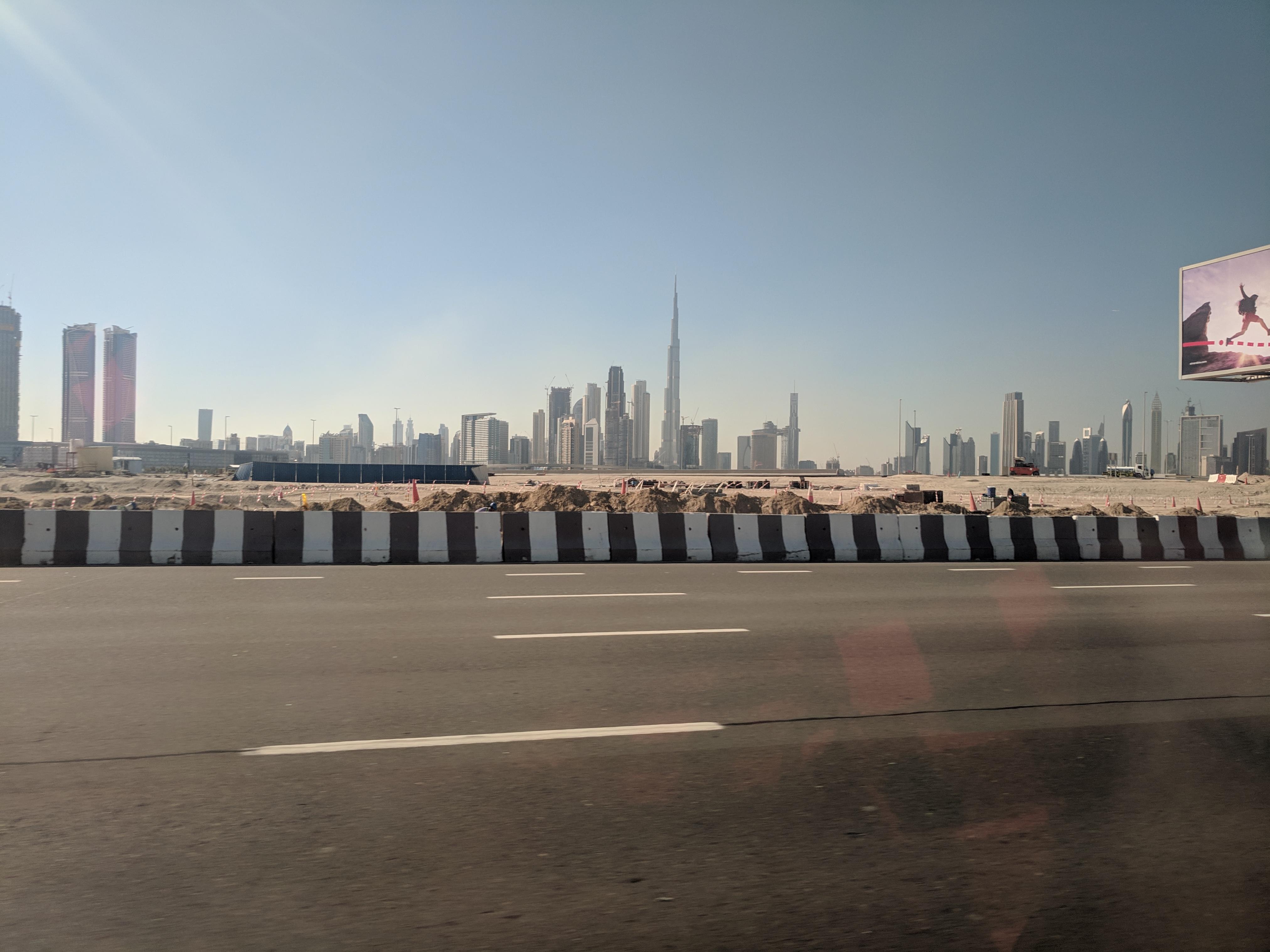 Dubai in the distance r/CityPorn