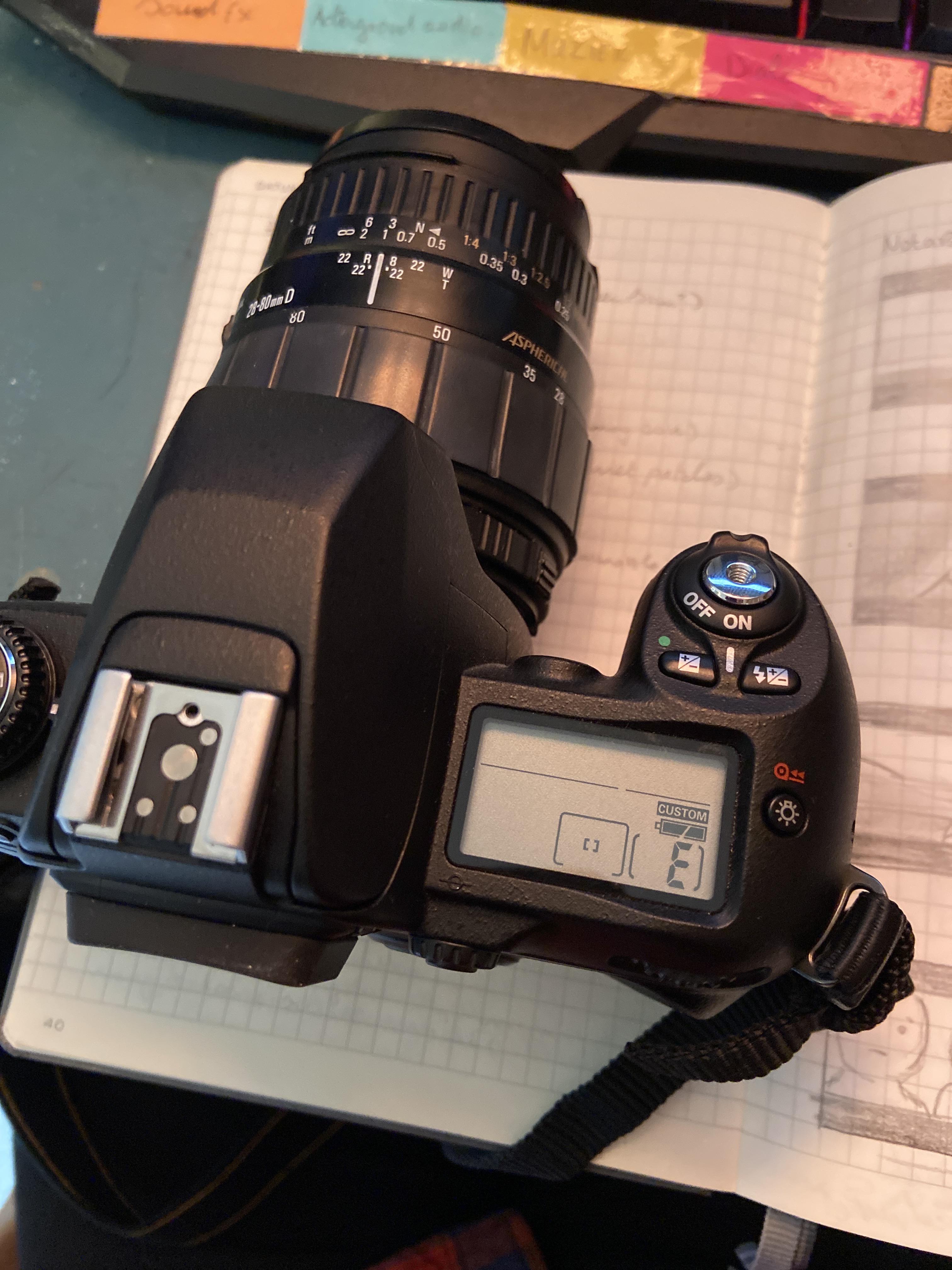 My Nikon F80 is stuck on showing empty, the film is loaded correctly, I